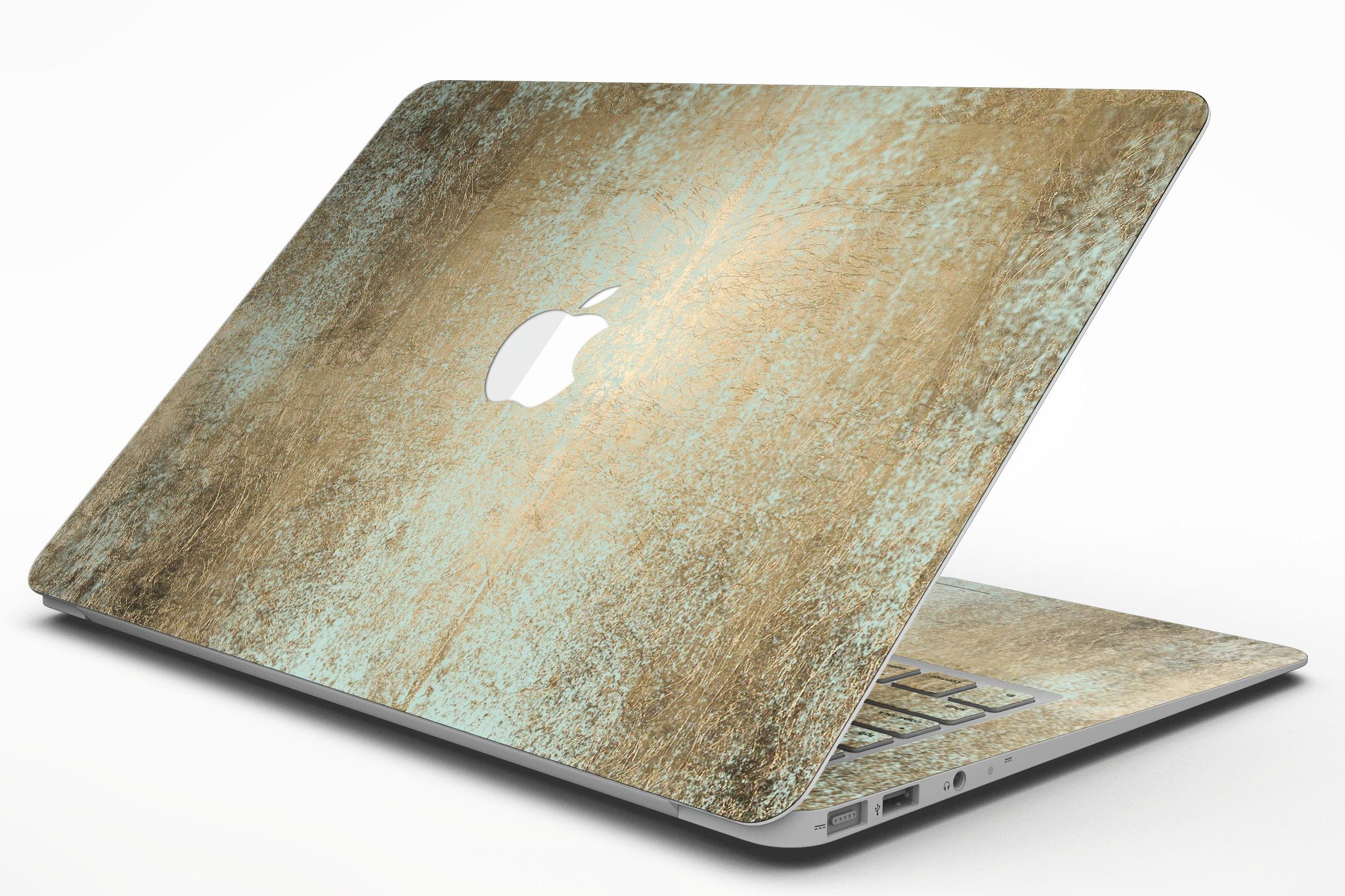 Gold Foiled Surface skin kit for MacBook Air, showcasing a stylish design that protects the device from scratches.