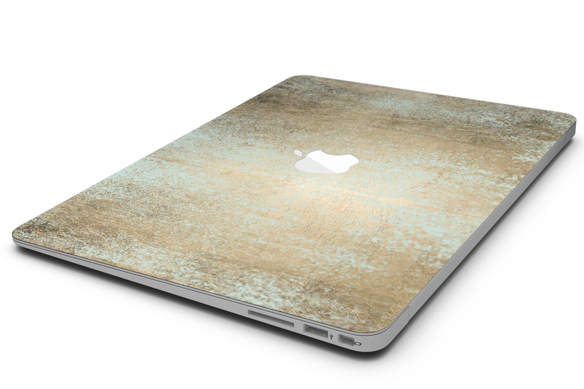 Gold Foiled Surface skin kit for MacBook Air, showcasing a stylish design that protects the device from scratches.