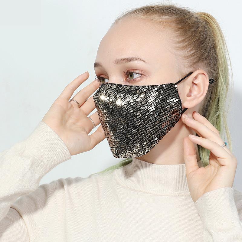 Gold Glitter Sparkling Fashion Mask with a stylish design, featuring a glittery black surface and two layers for added protection.