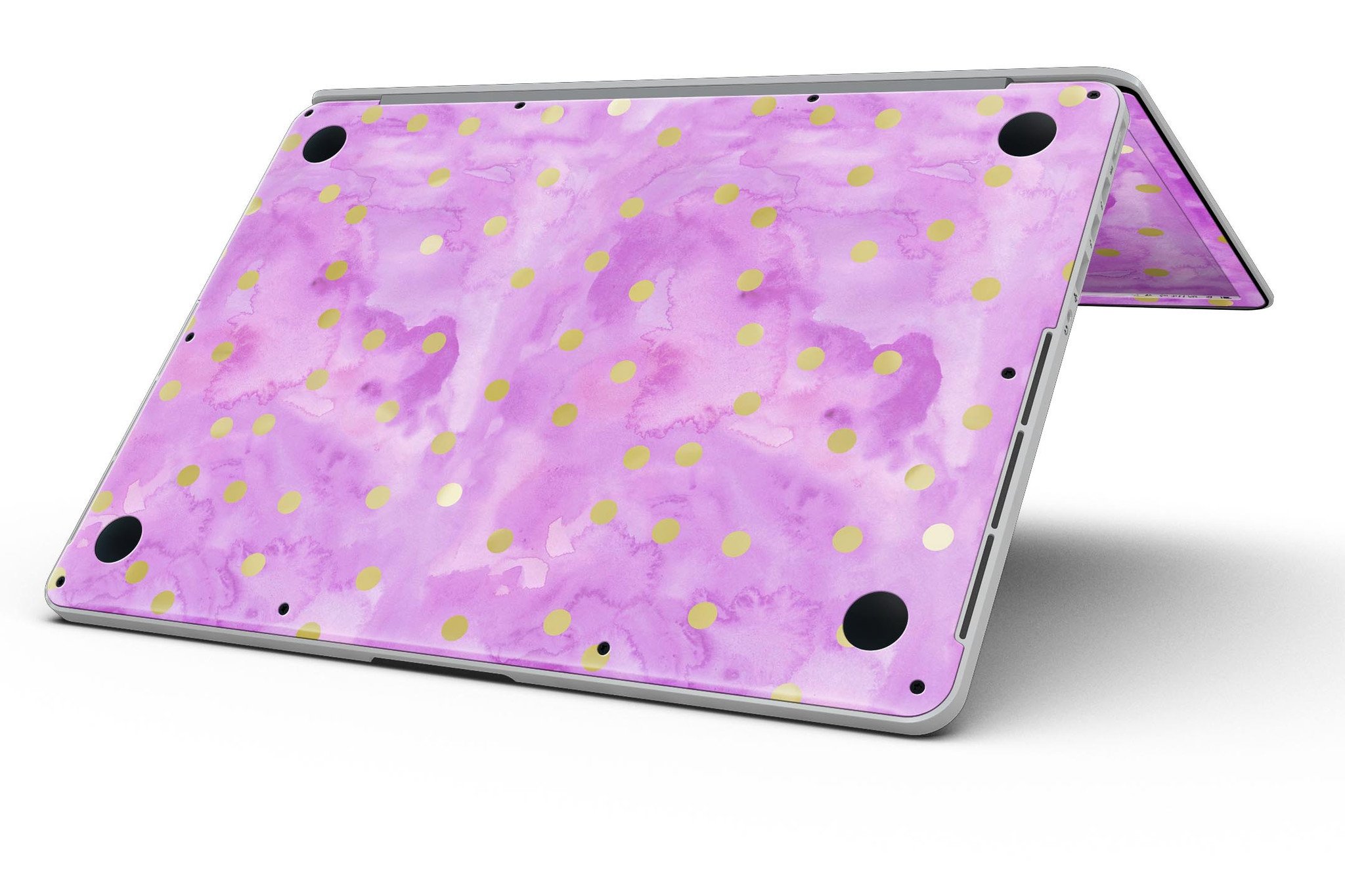 Gold polka dots design on a grungy pink surface skin for MacBook Pro with Retina Display, showcasing style and protection.