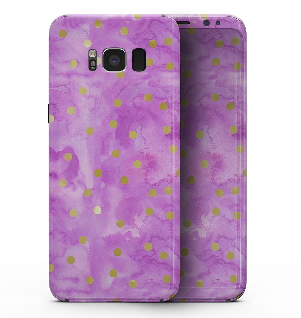 Samsung Galaxy S8 with Gold Polka Dots on a grungy pink surface, showcasing a stylish and protective design skin.