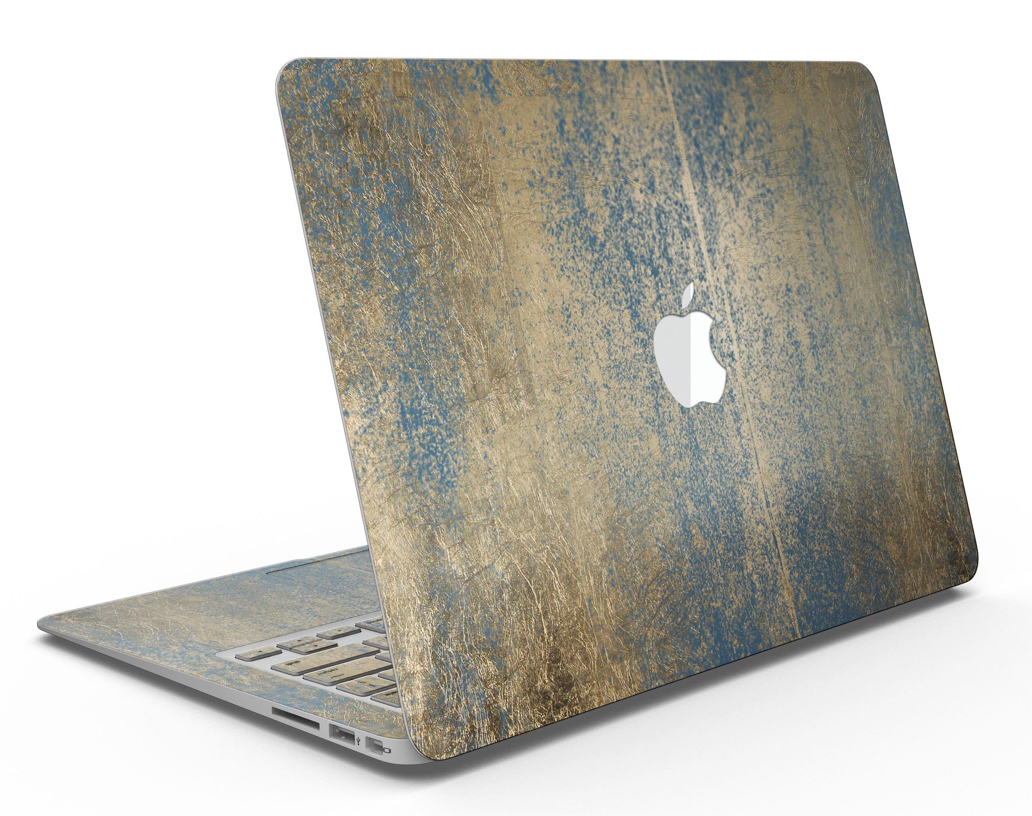 Gold Scratched Foil skin applied to a MacBook Air, showcasing its stylish design and premium finish.