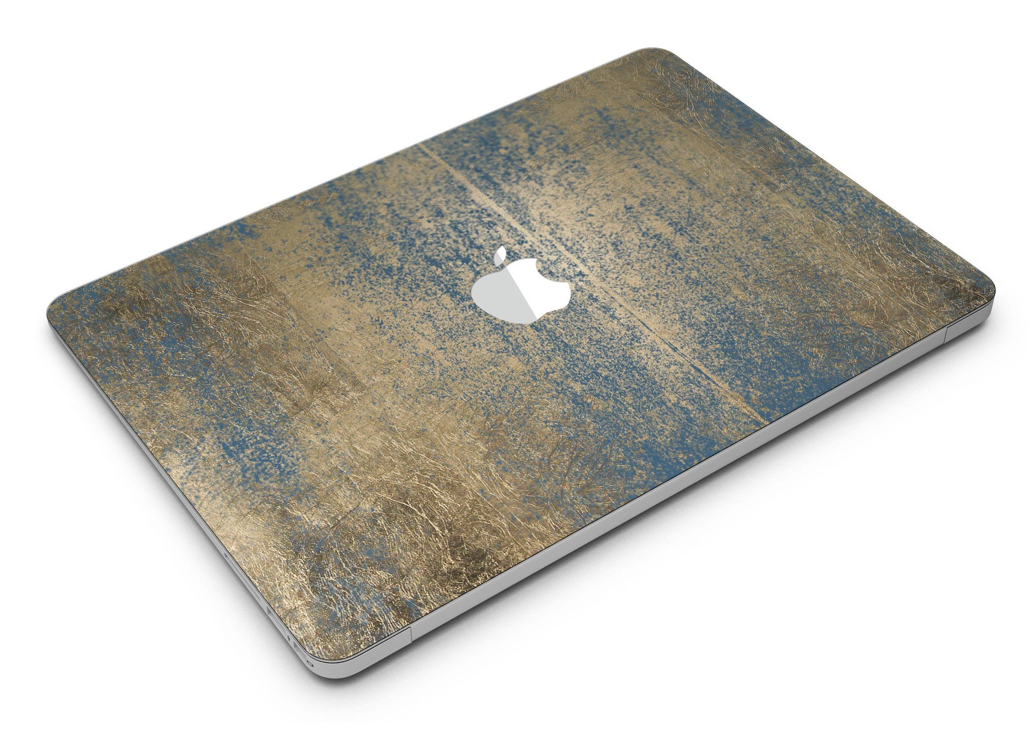 Gold Scratched Foil skin applied to a MacBook Air, showcasing its stylish design and premium finish.