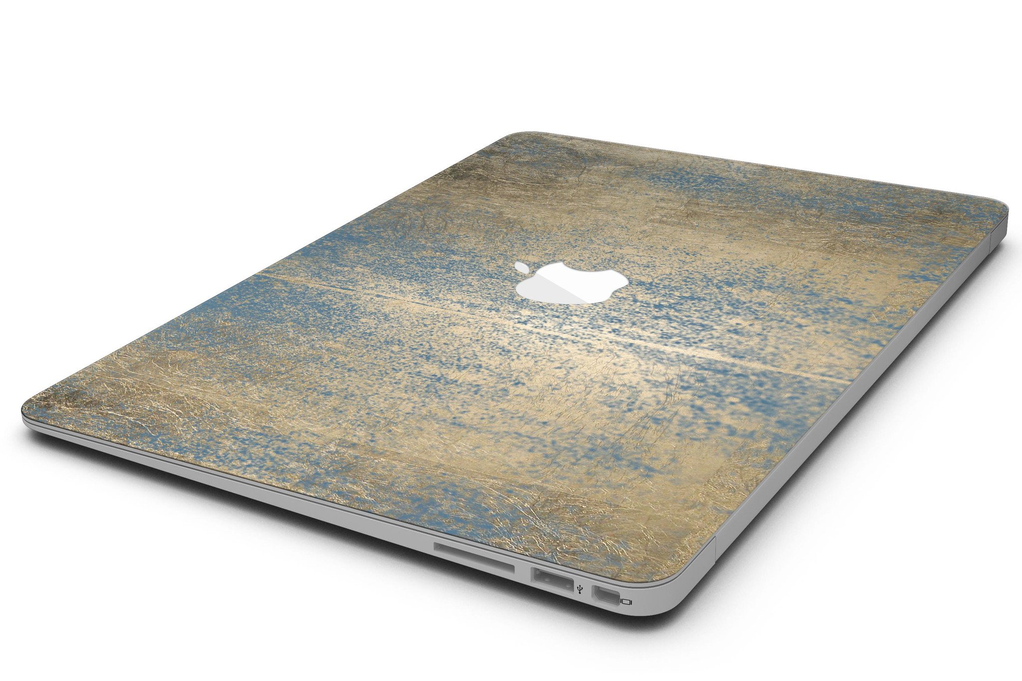 Gold Scratched Foil skin applied to a MacBook Air, showcasing its stylish design and premium finish.