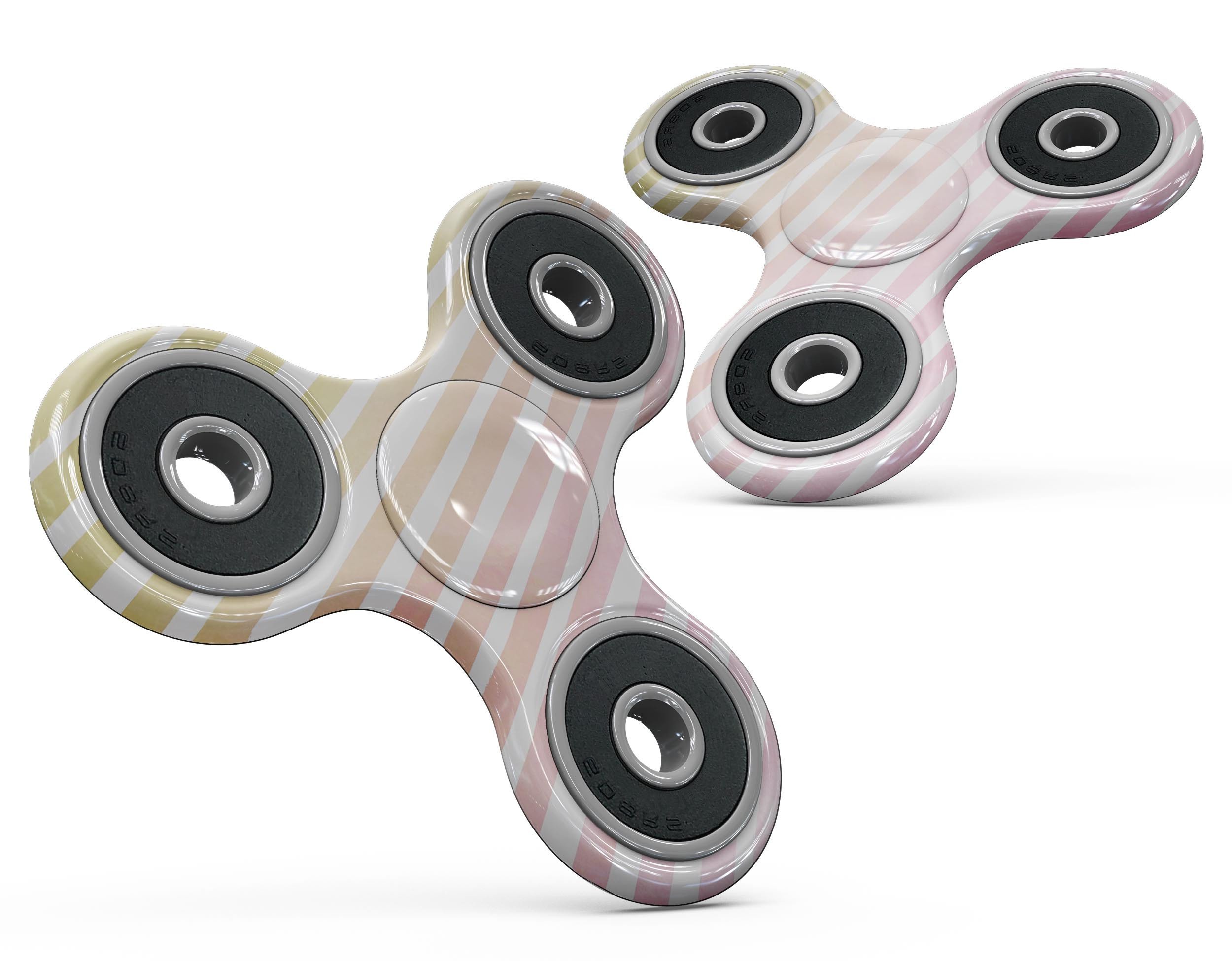 Gold to Pink WaterColor Ombre Stripes Full-Body Fidget Spinner skin showcasing vibrant colors and premium vinyl material.