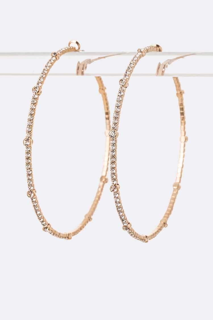 Gold Vay Holiday Earrings featuring 80 MM crystal iconic hoops with a 3-inch drop, perfect for festive occasions.