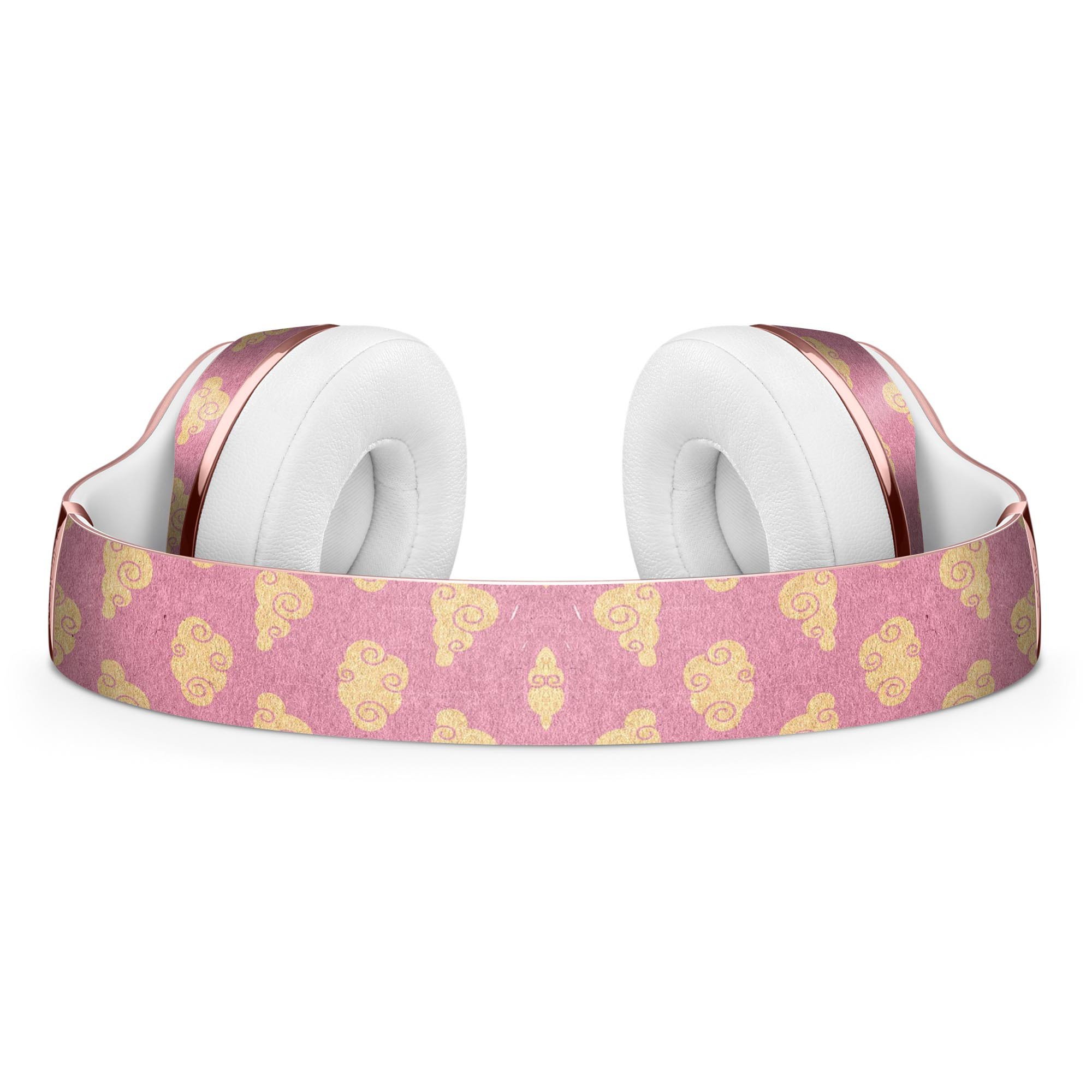 Golden Cartoon Clouds Skin Kit for Beats by Dre Solo 3 Wireless Headphones, featuring a playful design on a pink background.