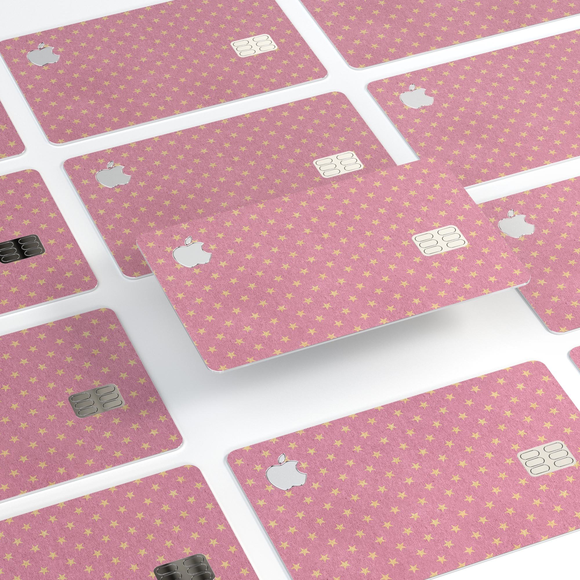 Golden Micro Stars skin kit for Apple Card, featuring a pink background and premium vinyl material for protection.