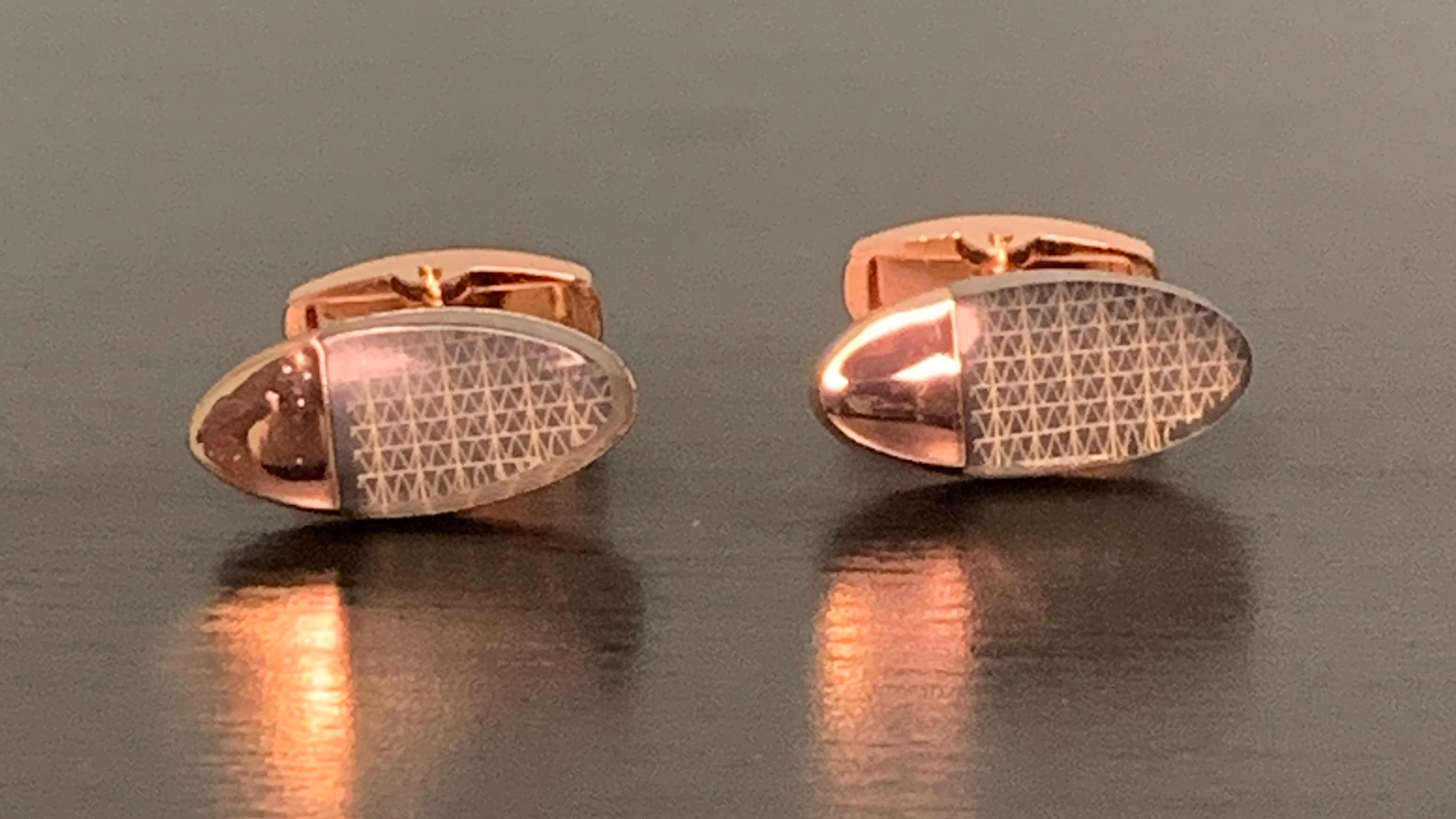 Elegant Golden Pill Cufflinks with a rose gold finish and looking glass pattern, perfect for formal occasions.