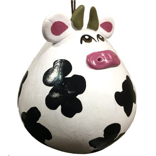 Hand-carved gourd cow ornament with ceramic accents, showcasing intricate designs and vibrant colors, perfect for home decor.