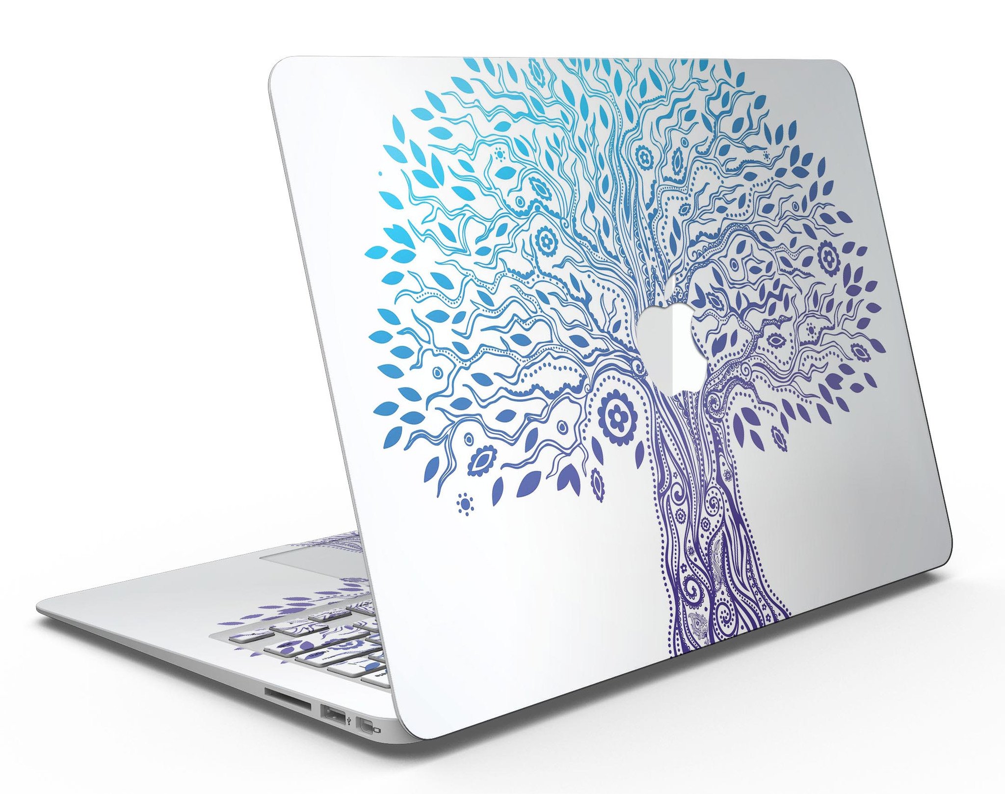 Gradiated Tree of Life MacBook Air Skin Kit showcasing vibrant colors and sleek design on a MacBook Air.