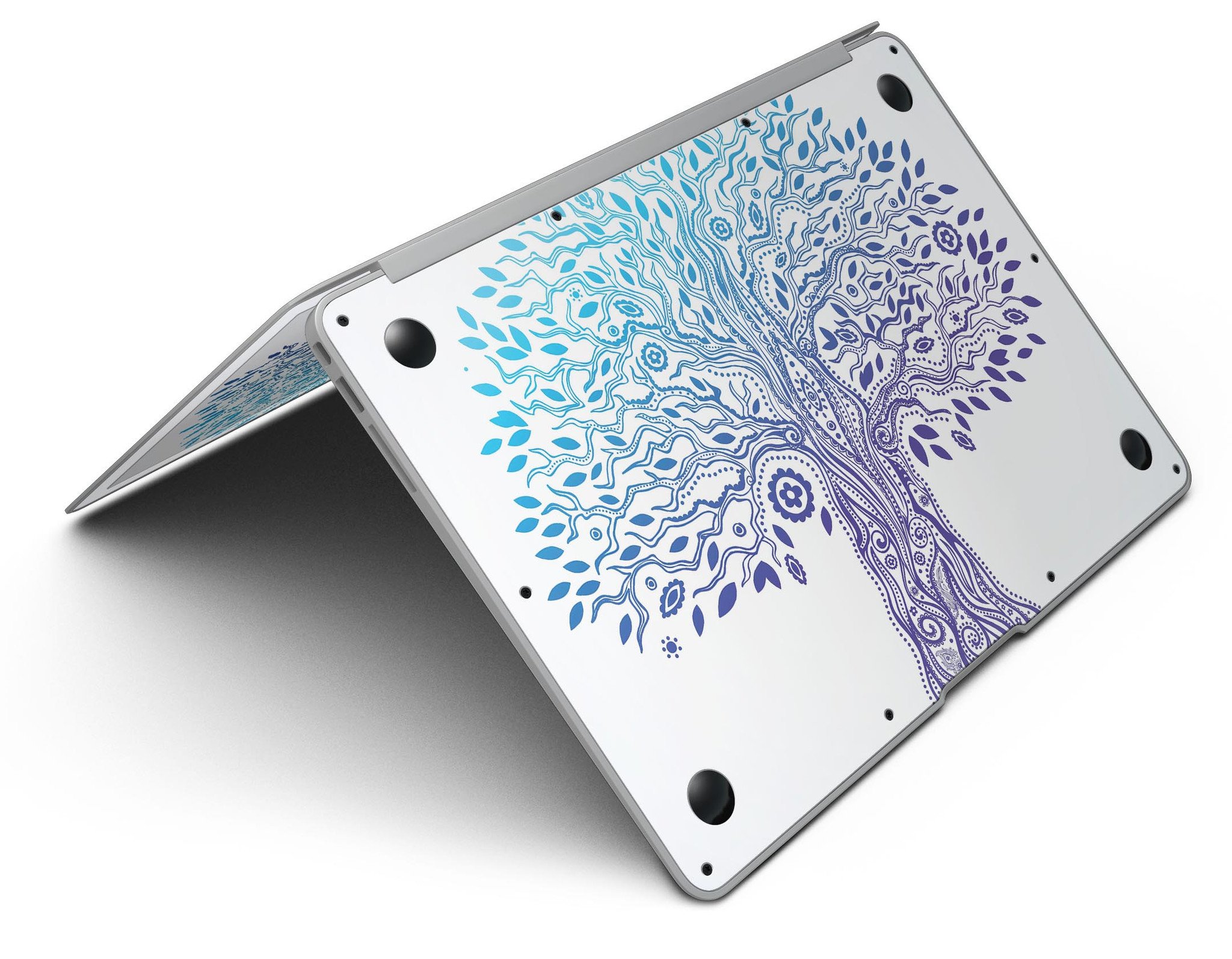 Gradiated Tree of Life MacBook Air Skin Kit showcasing vibrant colors and sleek design on a MacBook Air.