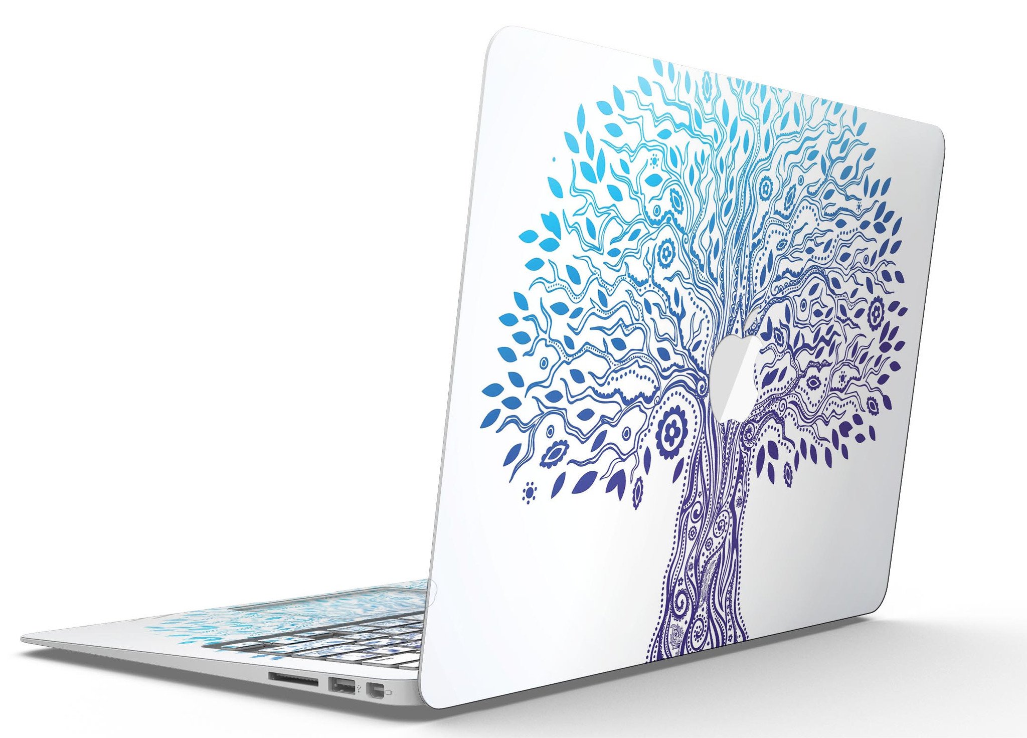 Gradiated Tree of Life MacBook Air Skin Kit showcasing vibrant colors and sleek design on a MacBook Air.