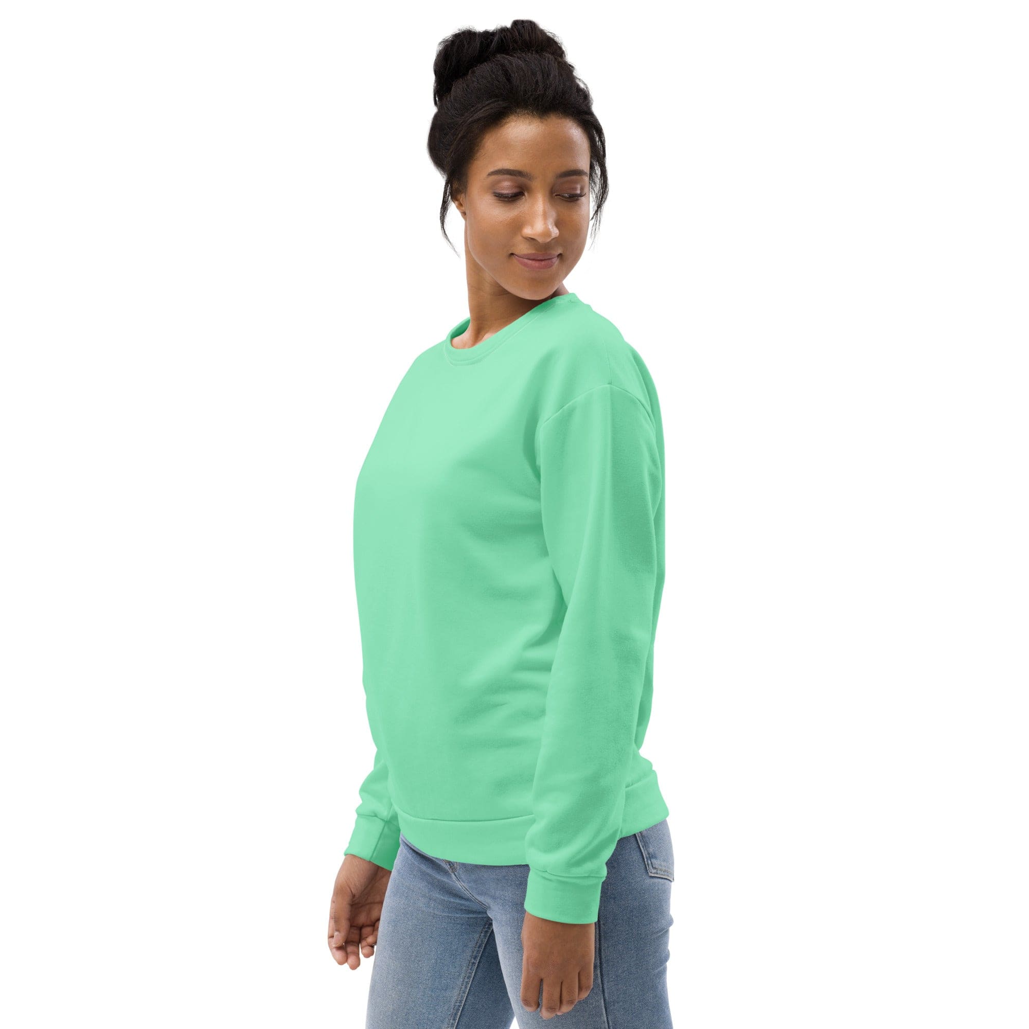 A stylish seafoam green graphic sweatshirt for women featuring bold prints and a comfortable crew neck design.