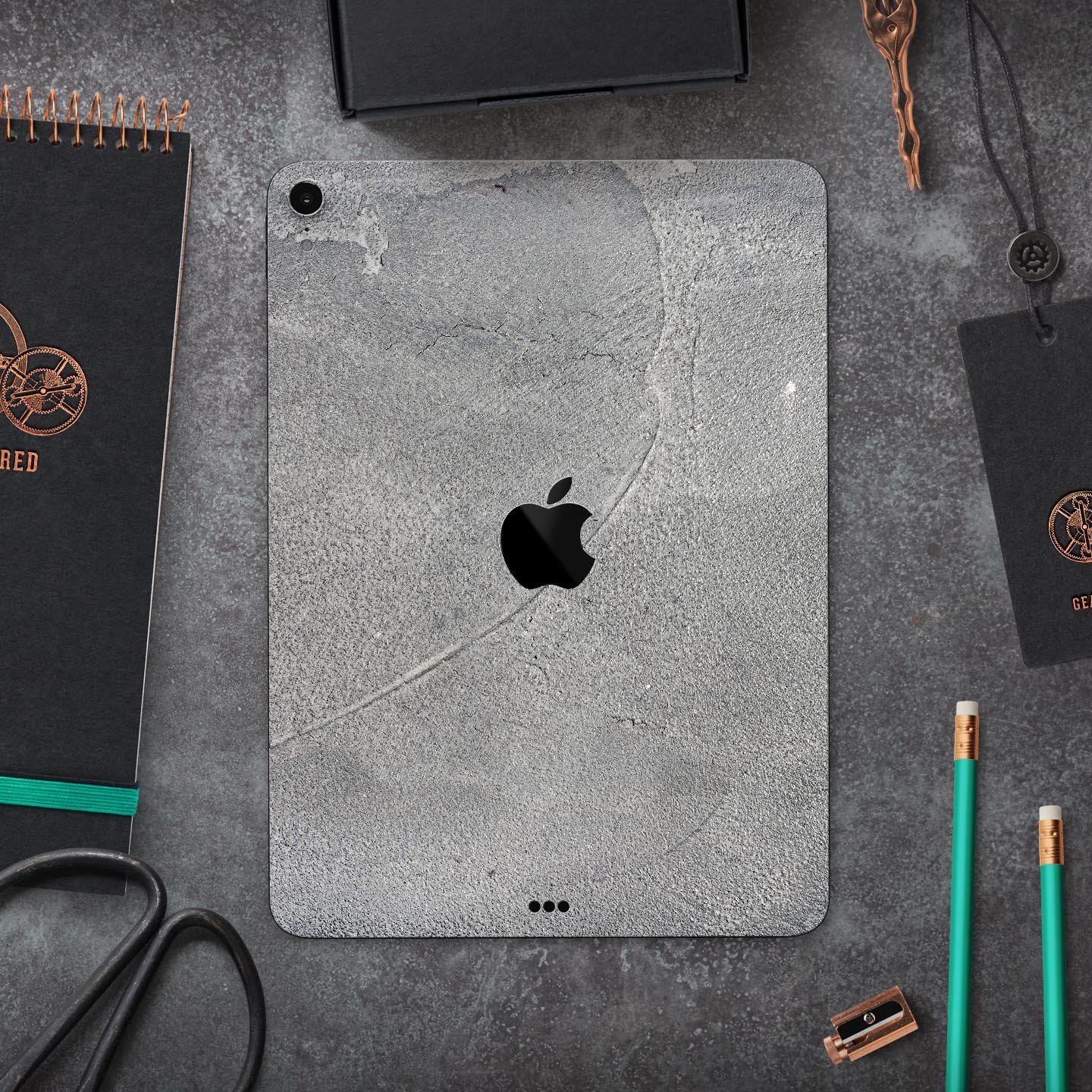 Gray Cracked Concrete Full Body Skin Decal for Apple iPad Pro, showcasing a stylish and protective design.