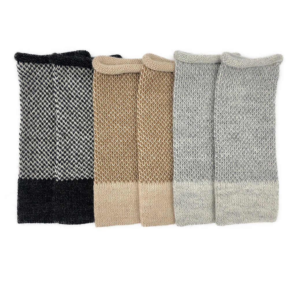 Gray interwoven alpaca fingerless gloves showcasing a textured design, perfect for style and warmth.