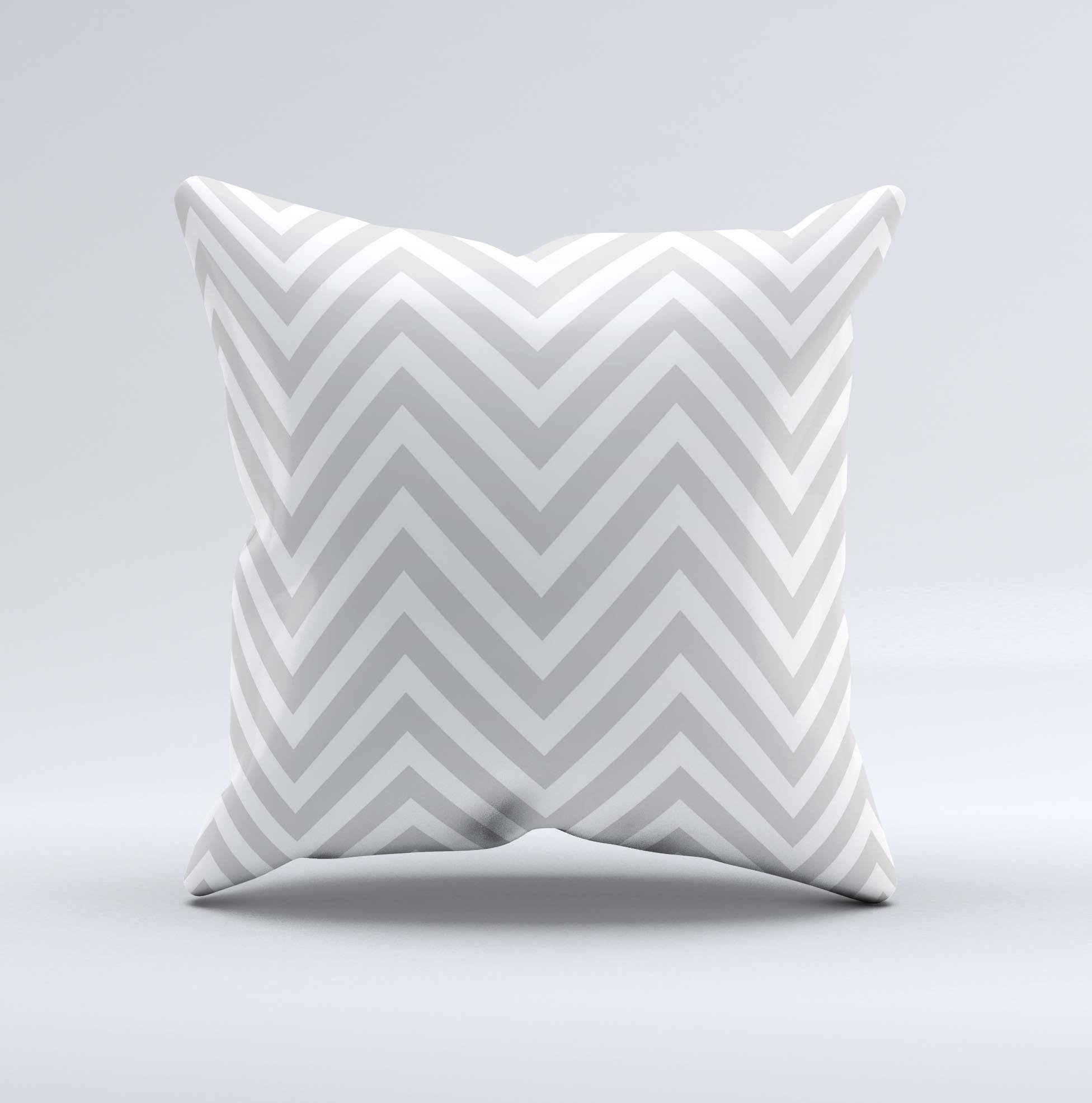 Gray and white decorative throw pillow featuring a sharp chevron pattern, handcrafted in Virginia with high-quality materials.