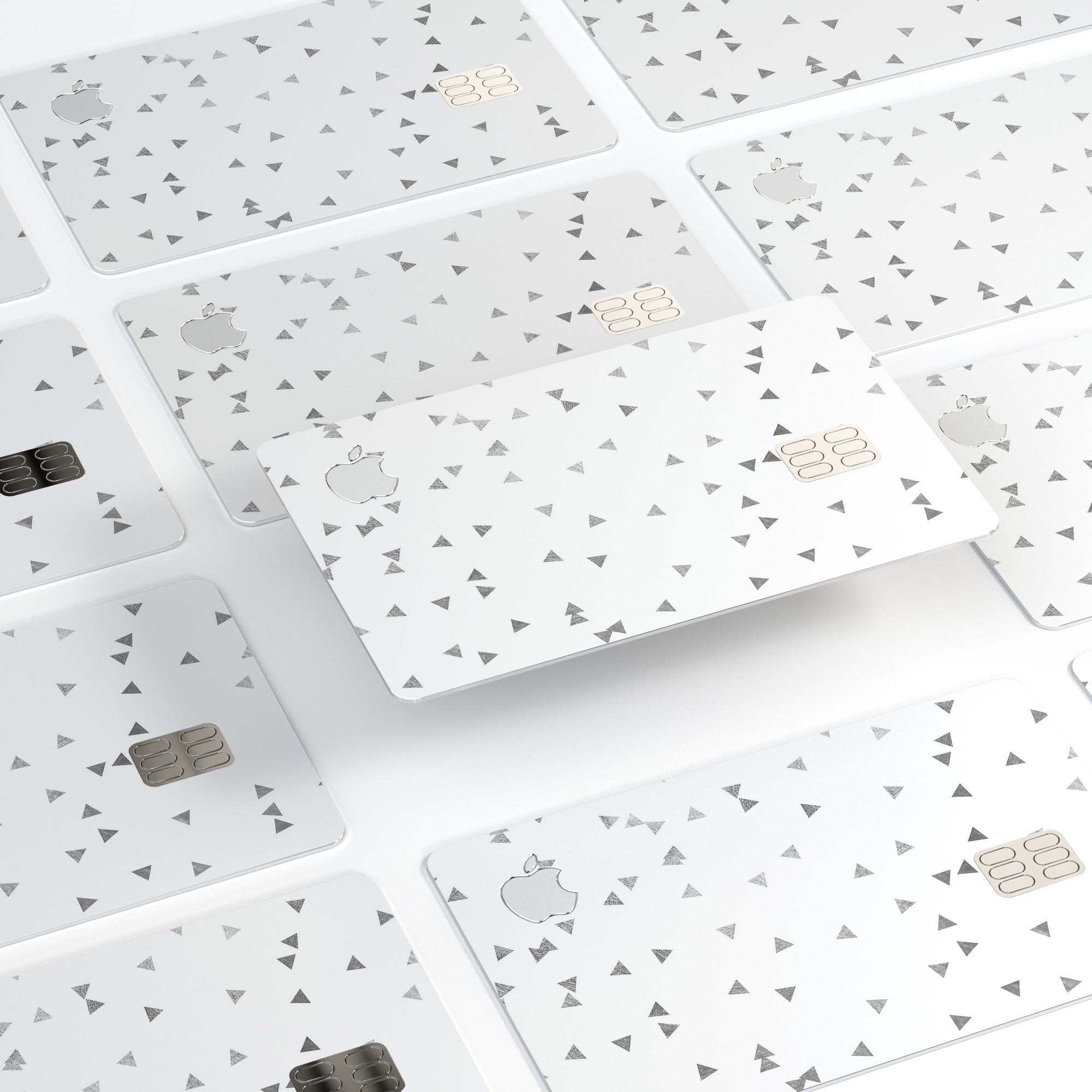 Grayscale Scattered Micro Triangles decal on an Apple Card, showcasing its stylish design and premium quality.