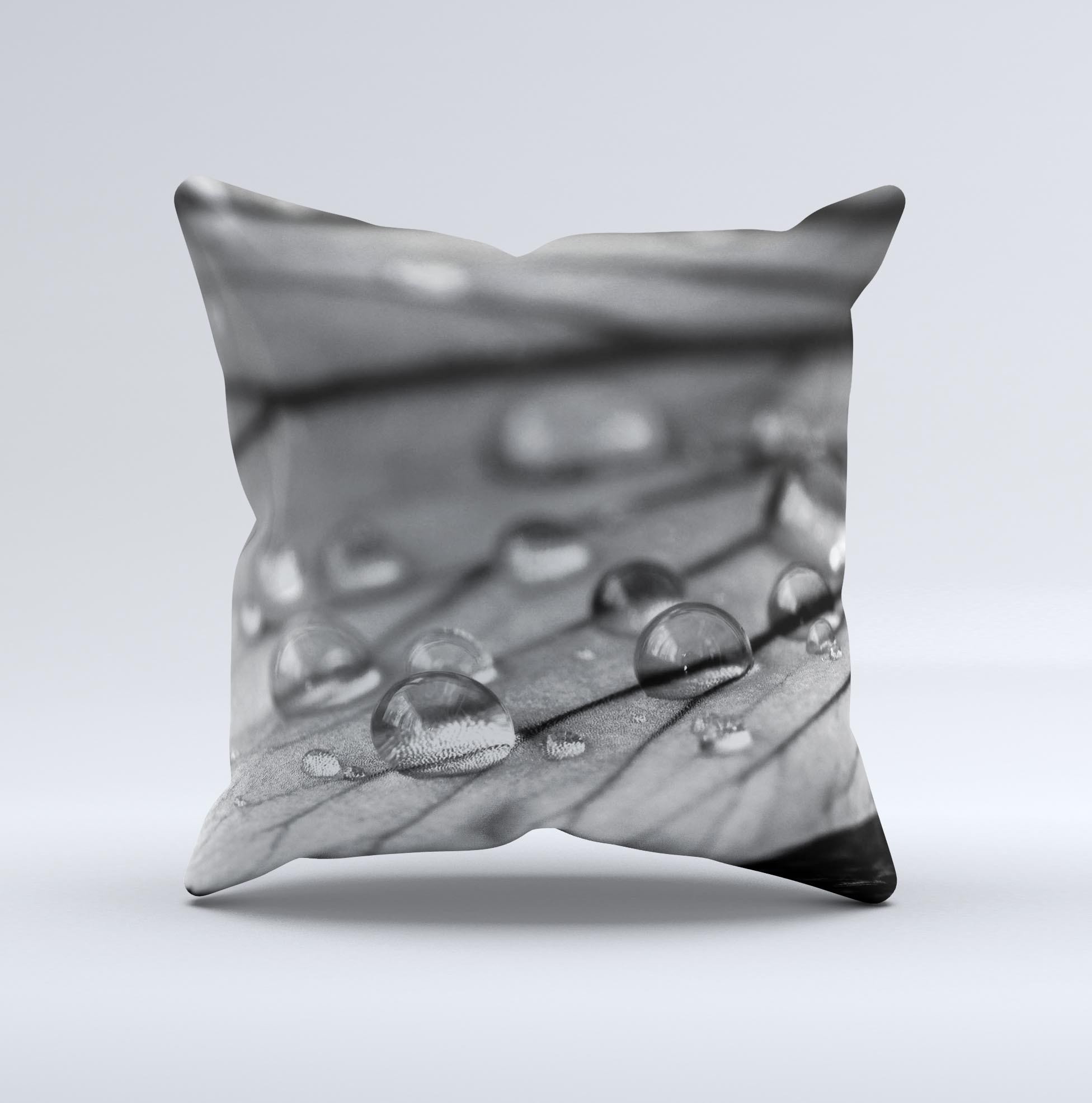 Grayscale Watered Leaf ink-Fuzed Decorative Throw Pillow showcasing a unique hand-produced design with soft fabric.