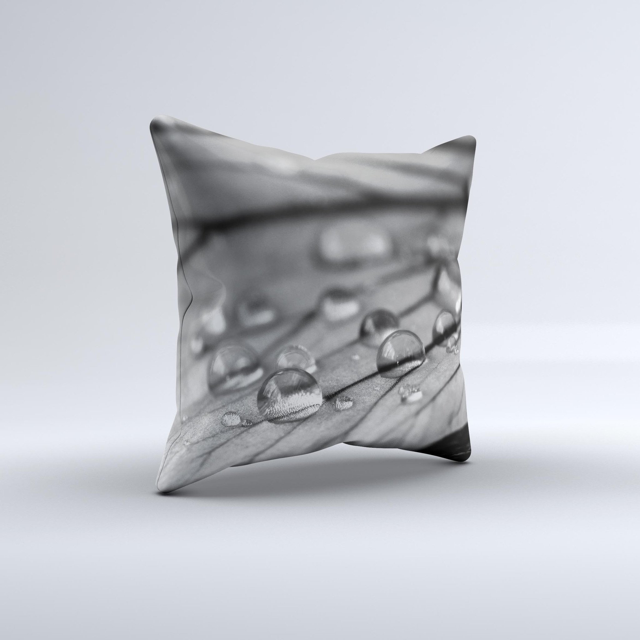 Grayscale Watered Leaf ink-Fuzed Decorative Throw Pillow showcasing a unique hand-produced design with soft fabric.