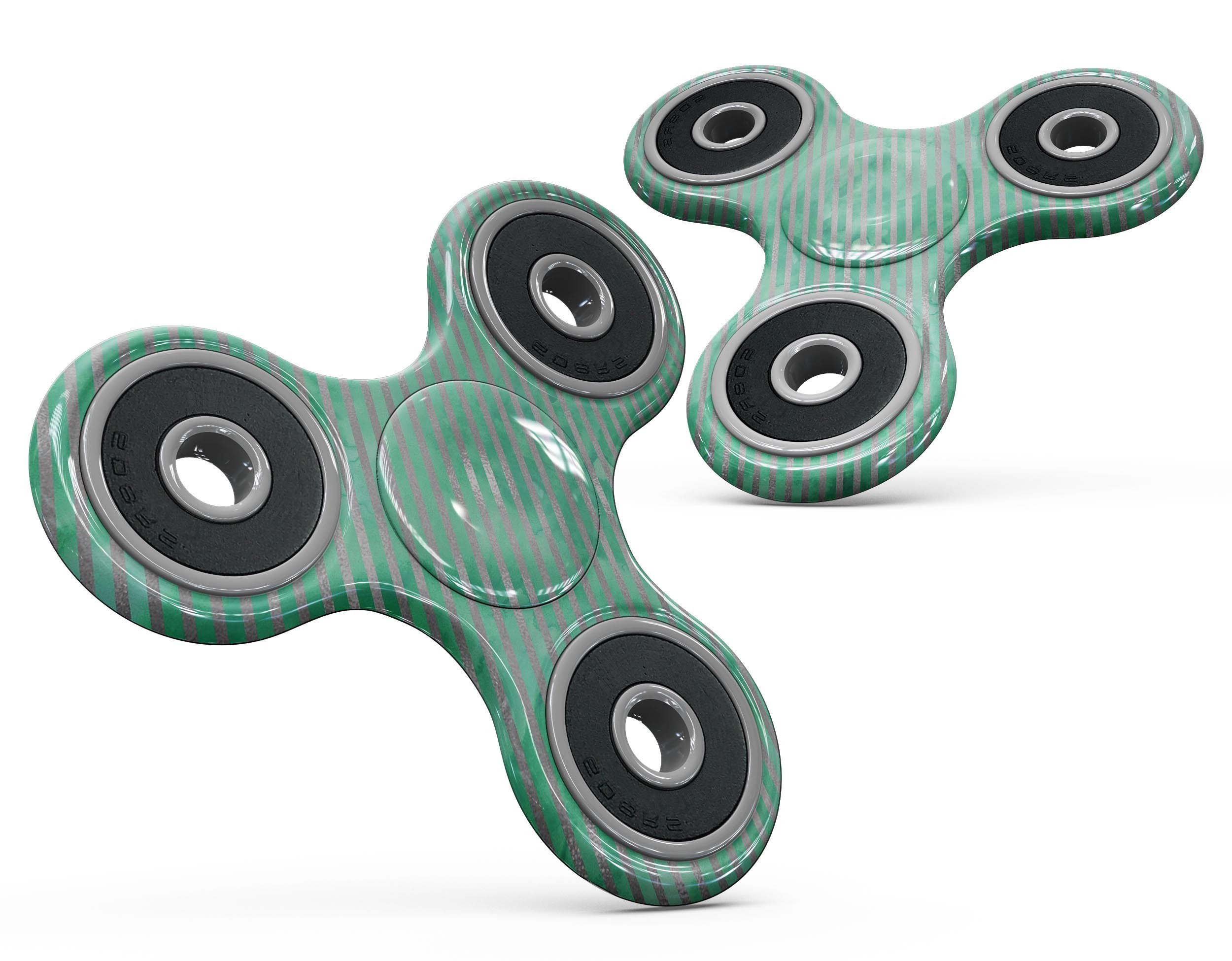 Green and silver watercolor diagonal stripes fidget spinner skin, showcasing vibrant colors and a stylish design.