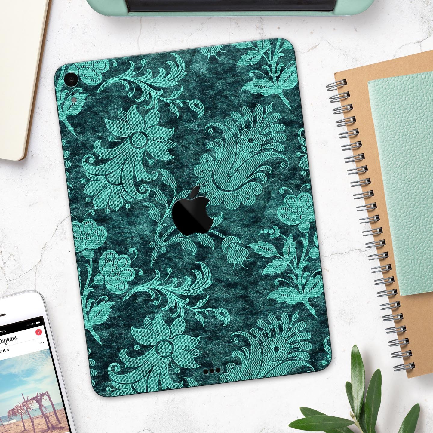 Green and Teal Floral Velvet v3 skin decal for Apple devices, showcasing a vibrant floral design on a sleek surface.