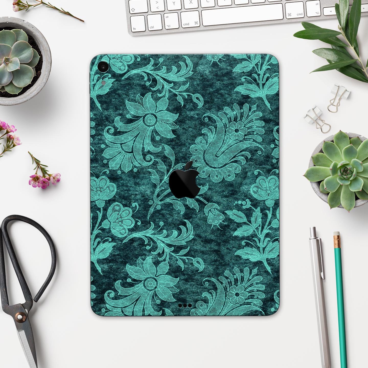 Green and Teal Floral Velvet v3 skin decal for Apple devices, showcasing a vibrant floral design on a sleek surface.