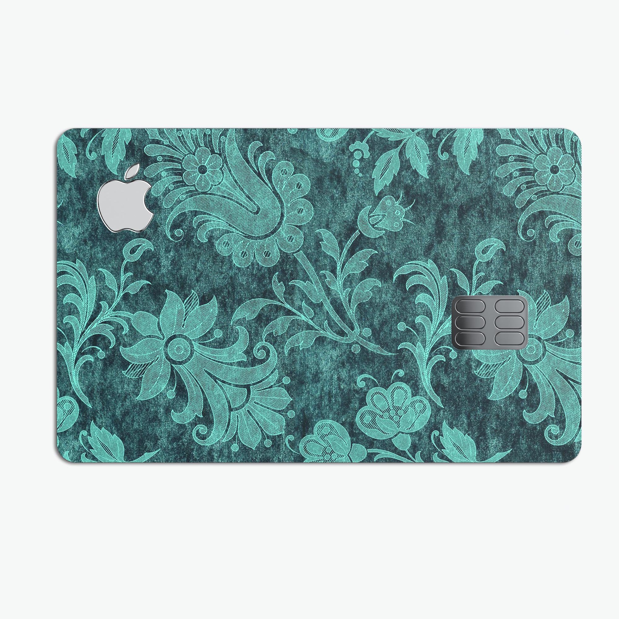 Green and teal floral velvet decal skin for Apple Card, showcasing a vibrant floral design on a premium protective vinyl.