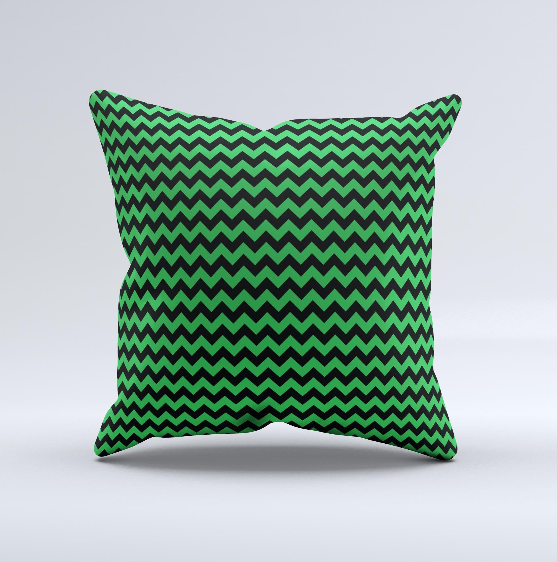 Green and black chevron pattern decorative throw pillow, handcrafted in Virginia with high thread count fabric and polyester filling.