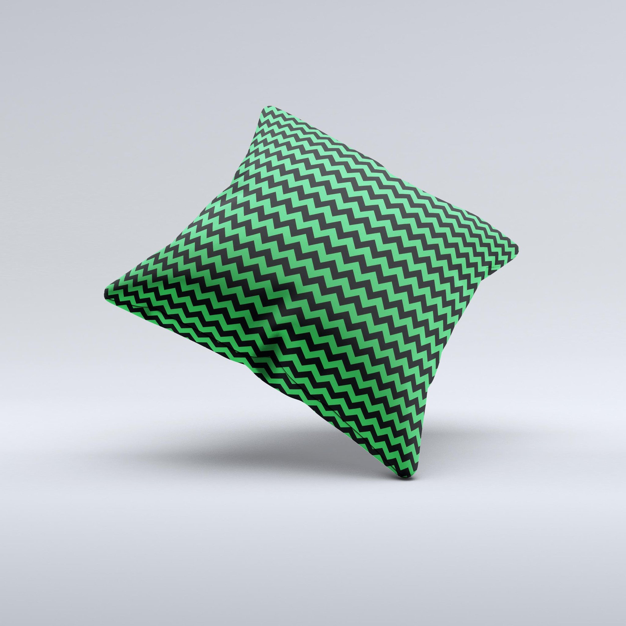 Green and black chevron pattern decorative throw pillow, handcrafted in Virginia with high thread count fabric and polyester filling.