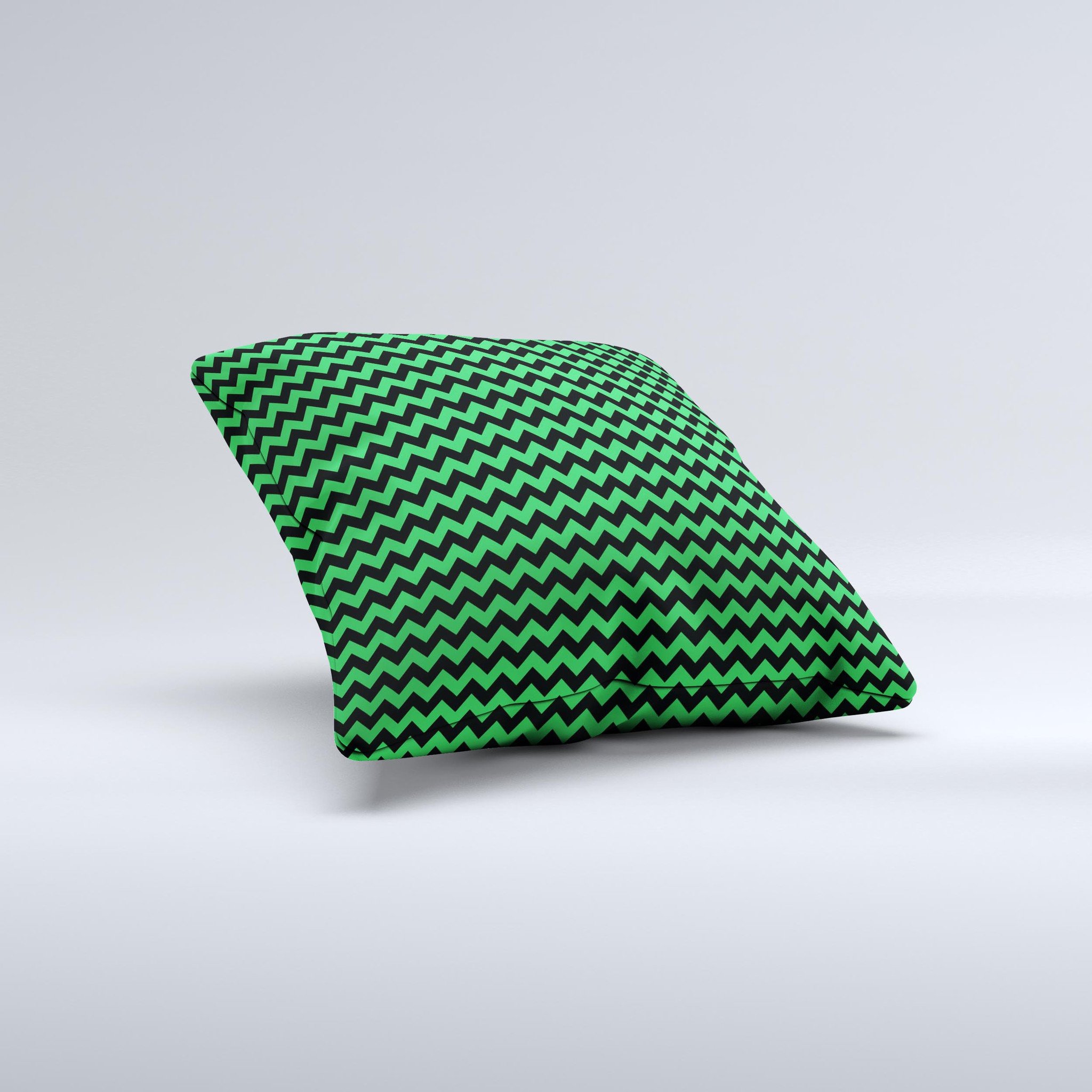 Green and black chevron pattern decorative throw pillow, handcrafted in Virginia with high thread count fabric and polyester filling.