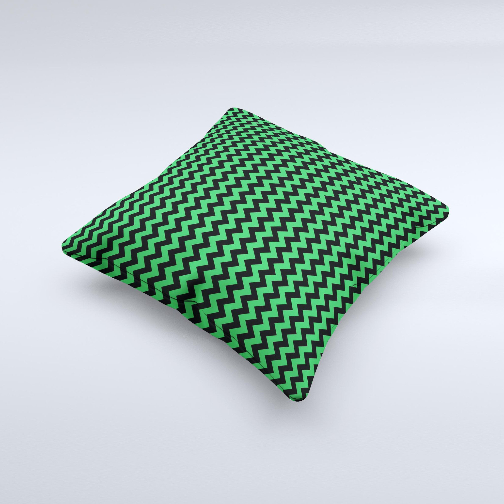 Green and black chevron pattern decorative throw pillow, handcrafted in Virginia with high thread count fabric and polyester filling.