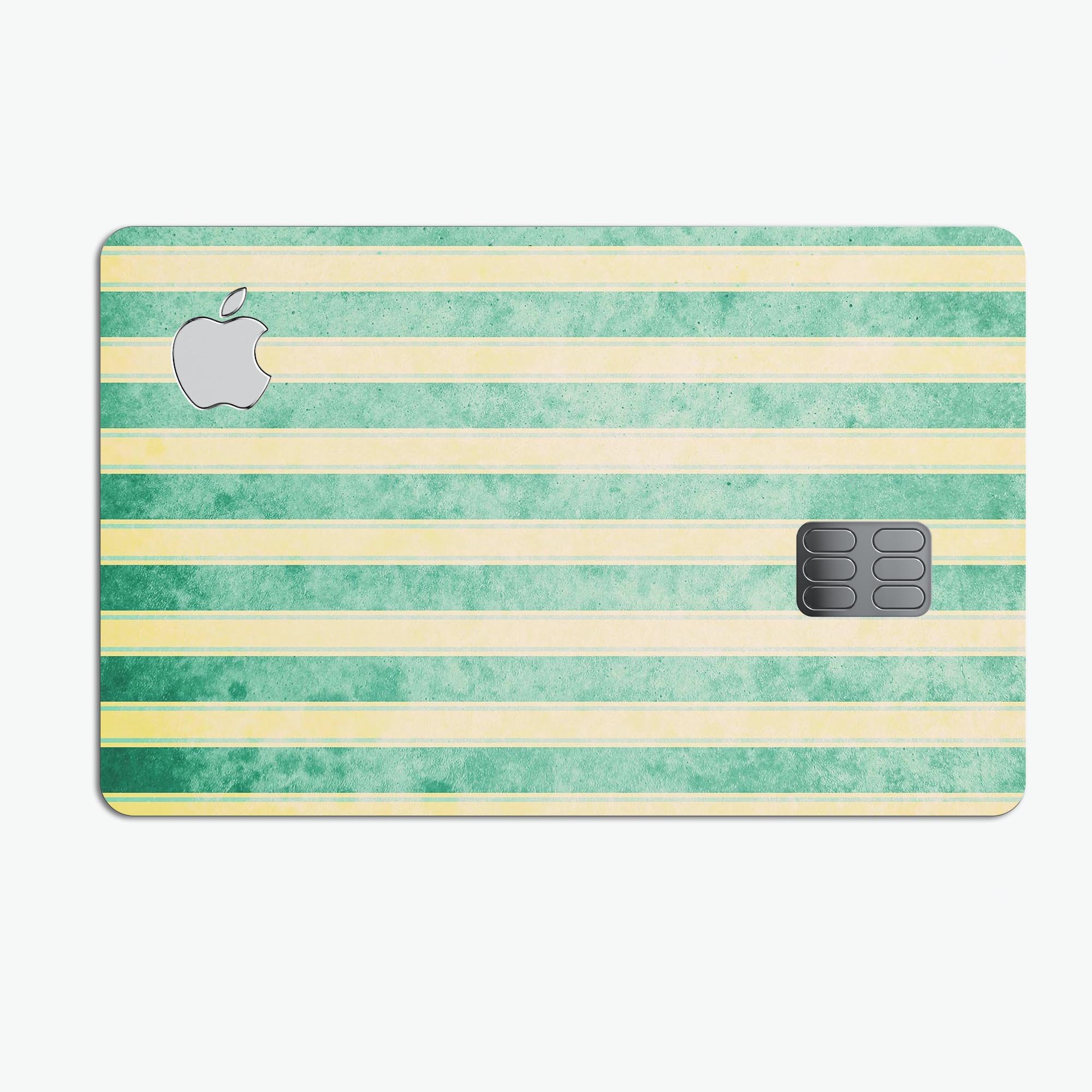 Green grunge vertical stripes decal on a yellow background, designed for Apple Card protection.