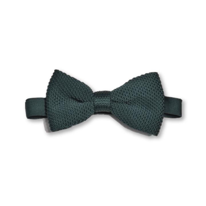 A stylish green knitted bow tie displayed on a white background, showcasing its texture and adjustable strap.