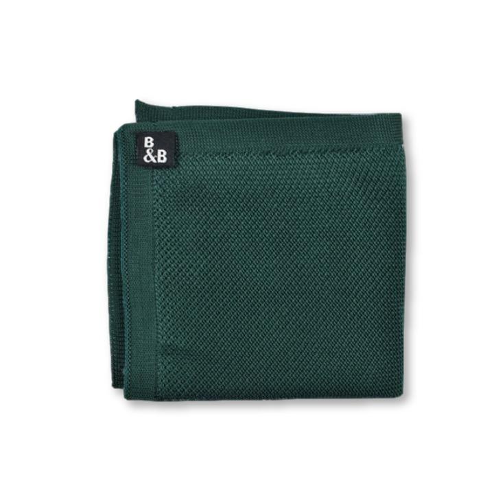 A stylish green knitted pocket square, measuring 23cm x 23cm, made from high-quality polyester, perfect for formal and casual occasions.