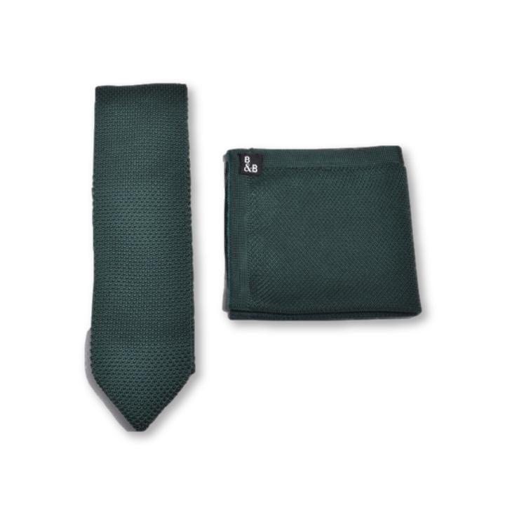 A stylish green knitted tie paired with a matching pocket square, showcasing a textured design suitable for formal occasions.