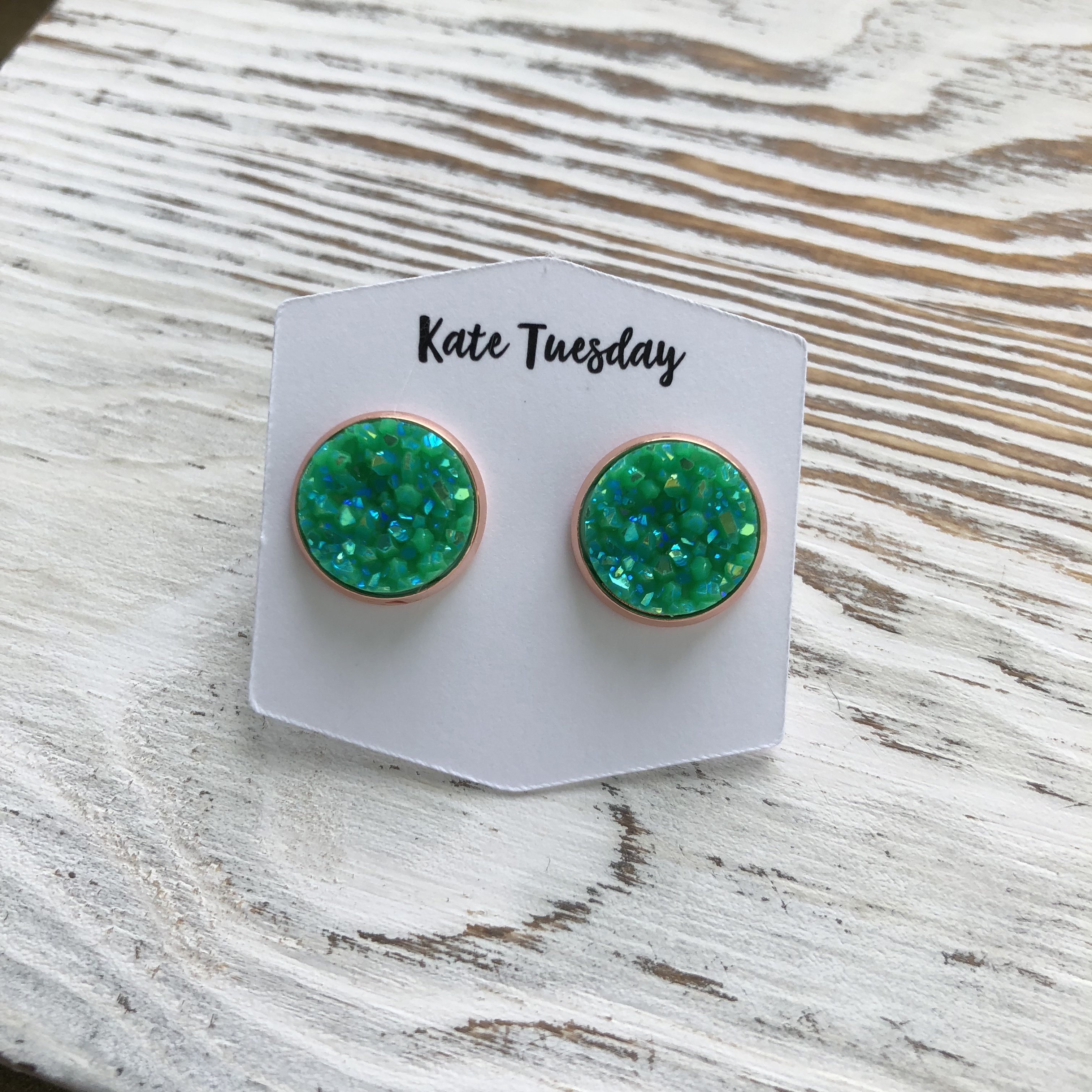 A pair of elegant Green Matte Sparkle Druzy Earrings featuring a 12mm druzy stone with a matte finish, set in silver, bronze, gold, or rose gold settings.