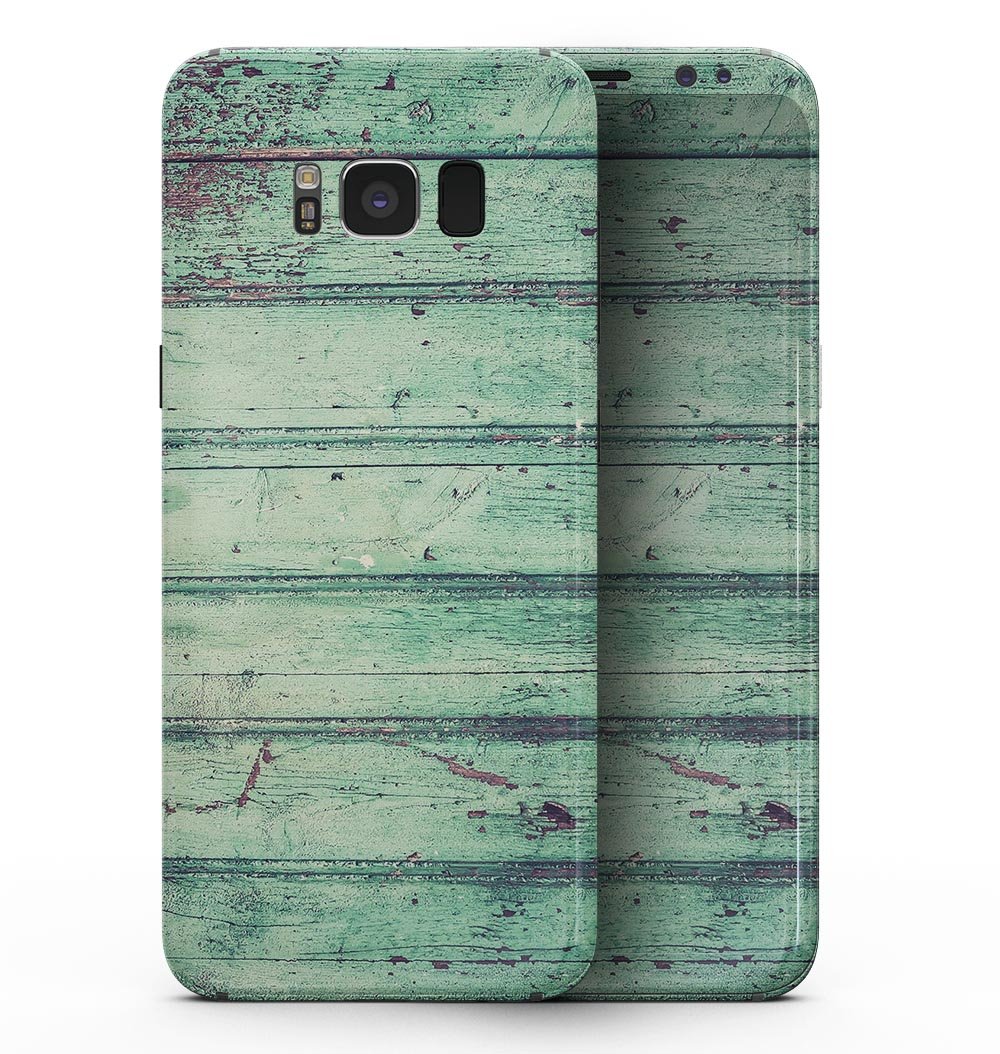 Green Peeling Planks skin kit for Samsung Galaxy S8, showcasing a stylish design that protects the device.