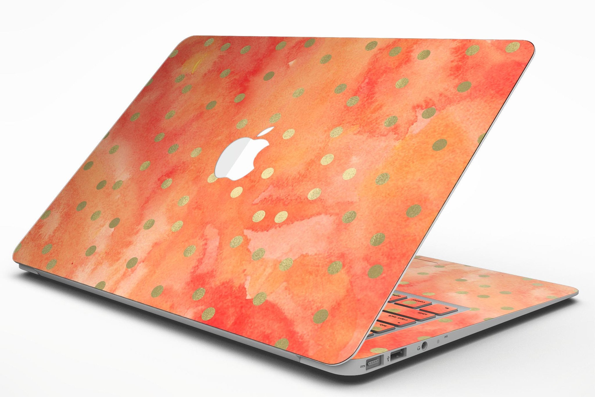 Green polka dots skin kit for MacBook Air, featuring a vibrant water-colored background, showcasing style and protection.