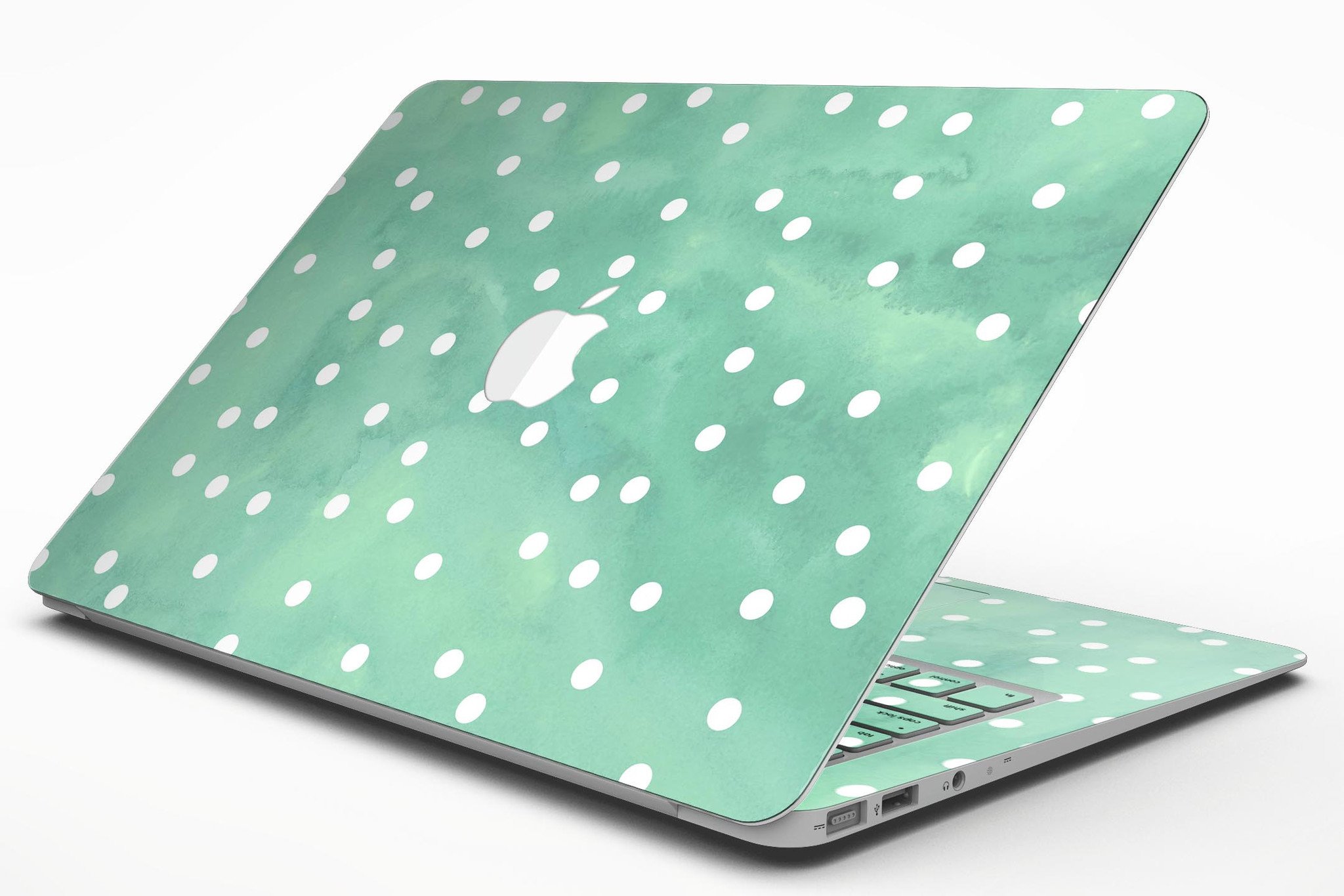 Green watercolor skin with white polka dots for MacBook Air, showcasing vibrant colors and stylish design.