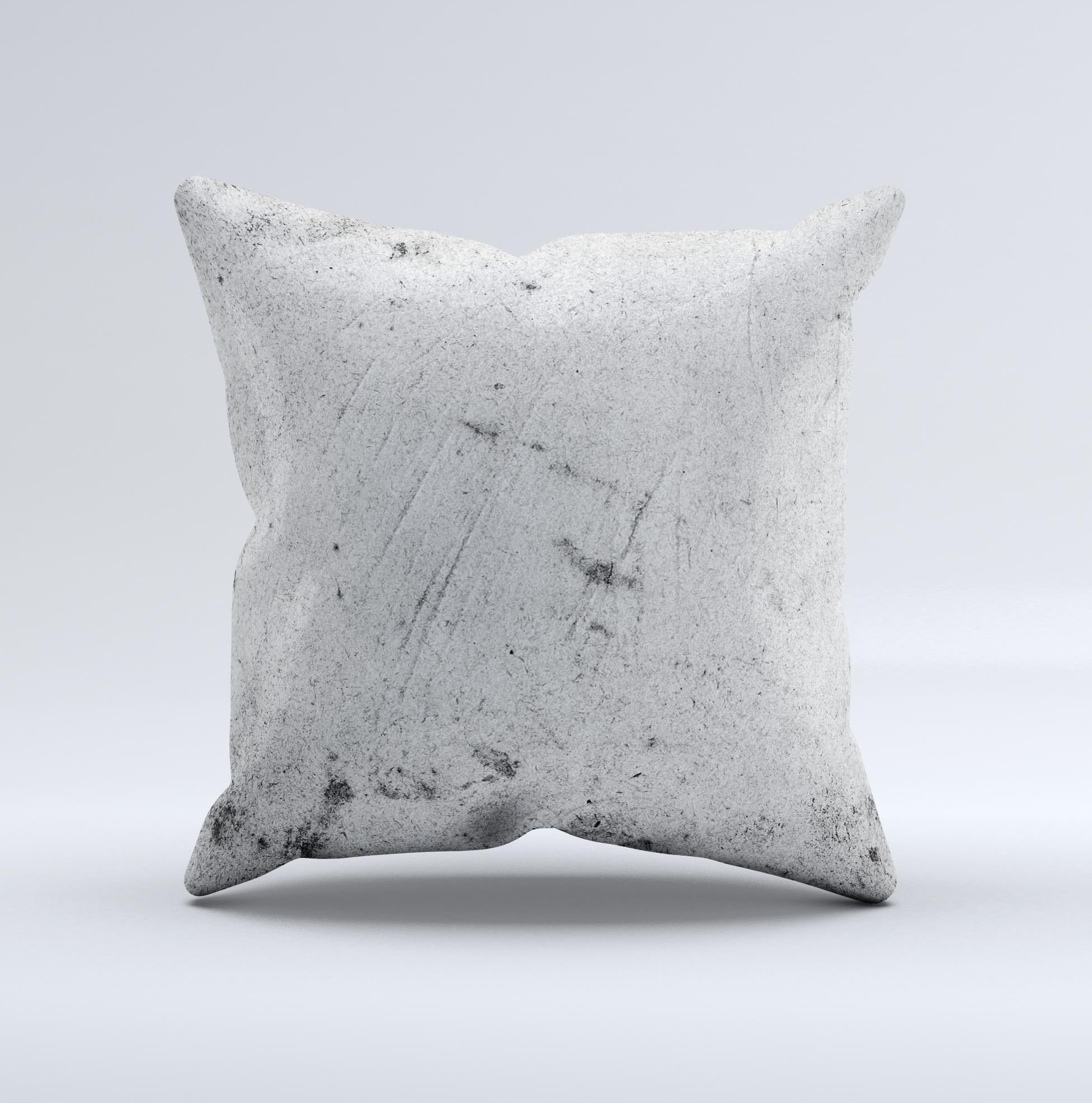 Grungy concrete textured decorative throw pillow with ink-fuzed design, showcasing unique handmade characteristics.