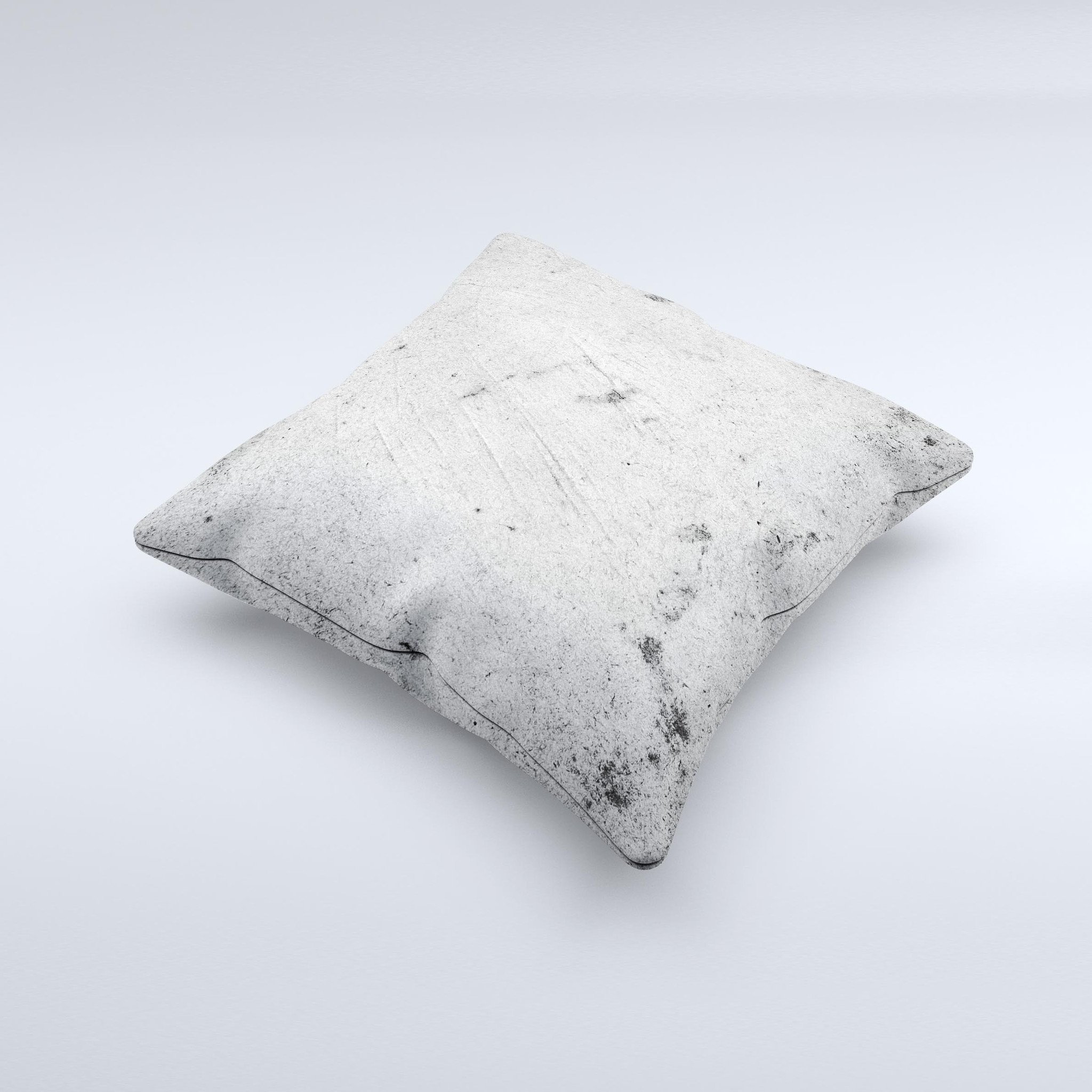 Grungy concrete textured decorative throw pillow with ink-fuzed design, showcasing unique handmade characteristics.