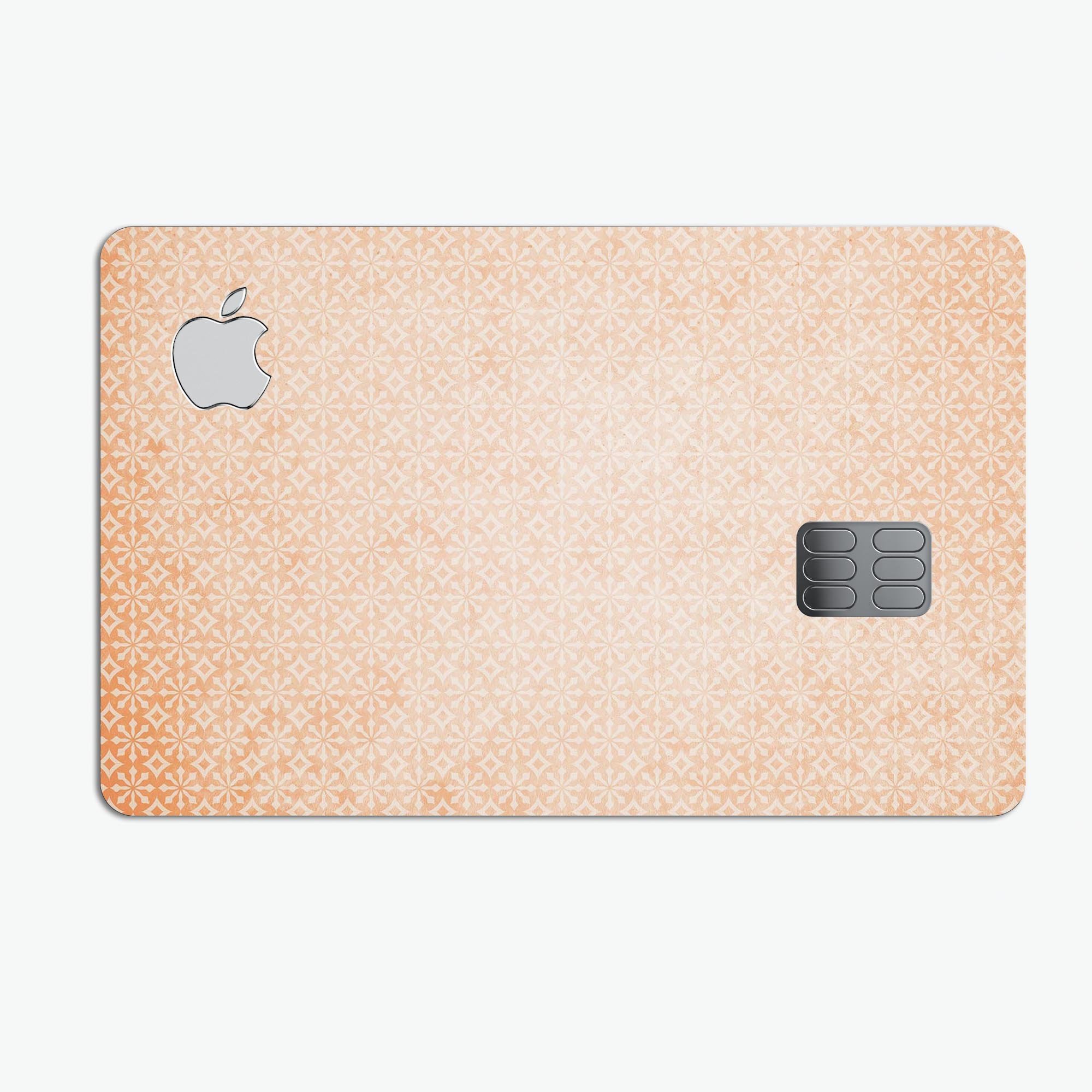 Grungy Coral Micro Snowflake Pattern decal on an Apple Card, showcasing its vibrant design and protective features.