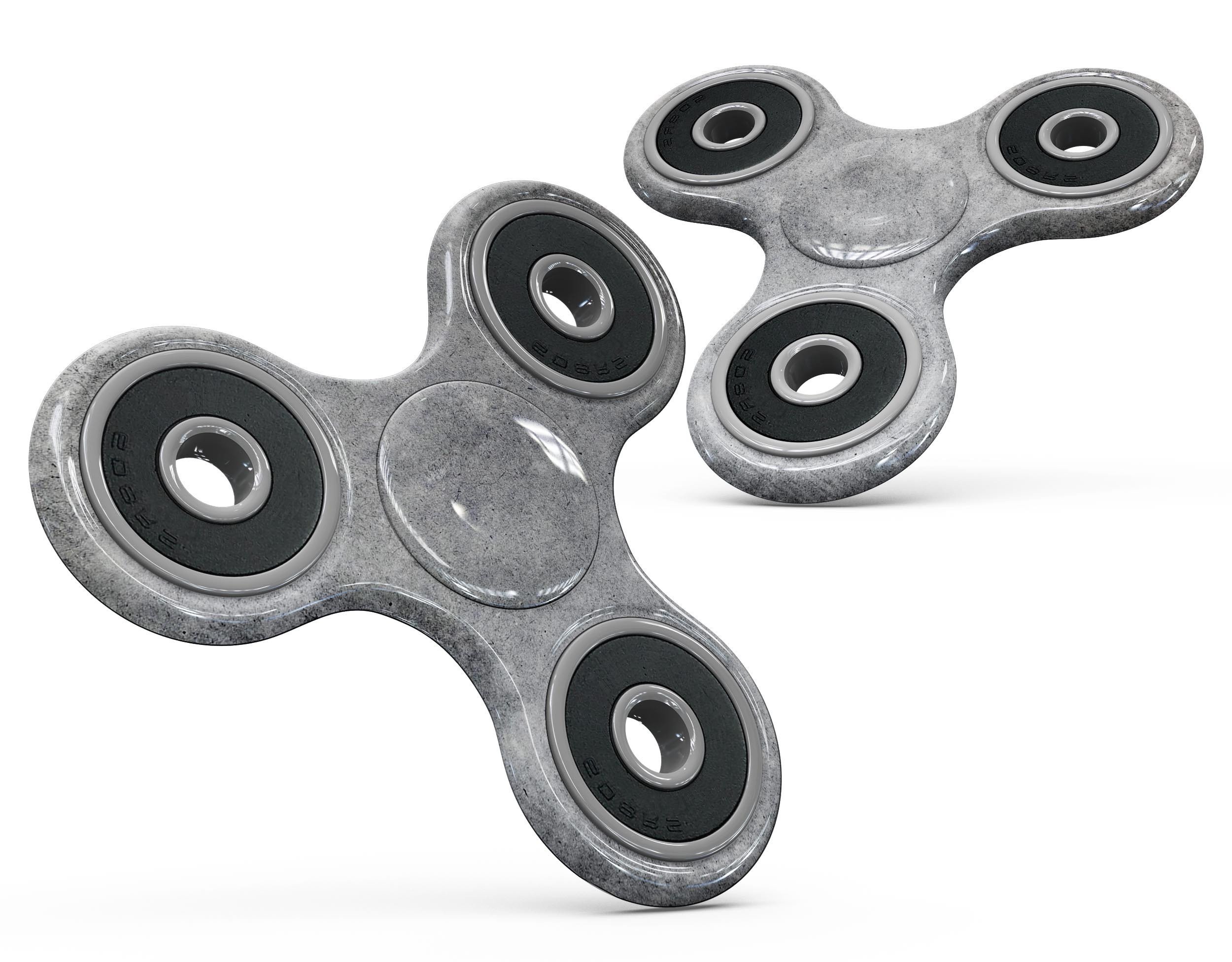 Grungy gray concrete surface skin kit for fidget spinner, showcasing a stylish and protective design.