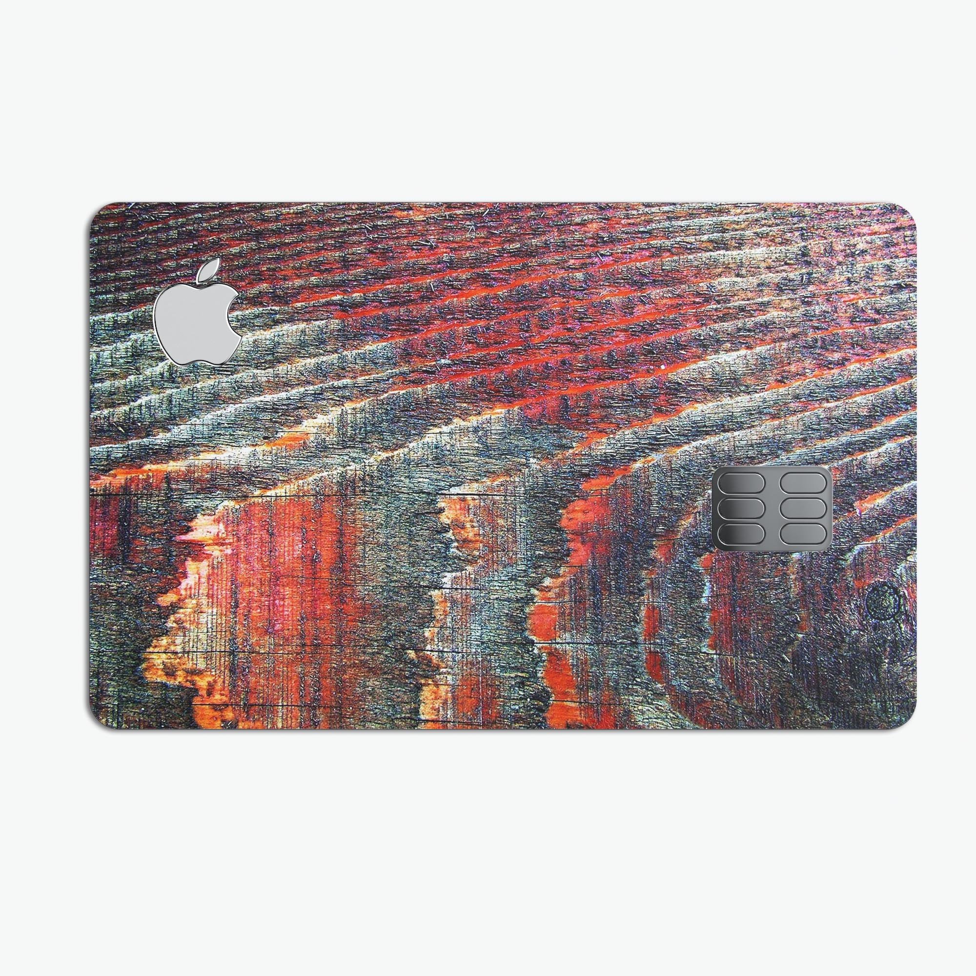 Grungy orange and teal dyed wood surface decal for Apple Card, showcasing a stylish design and premium quality.