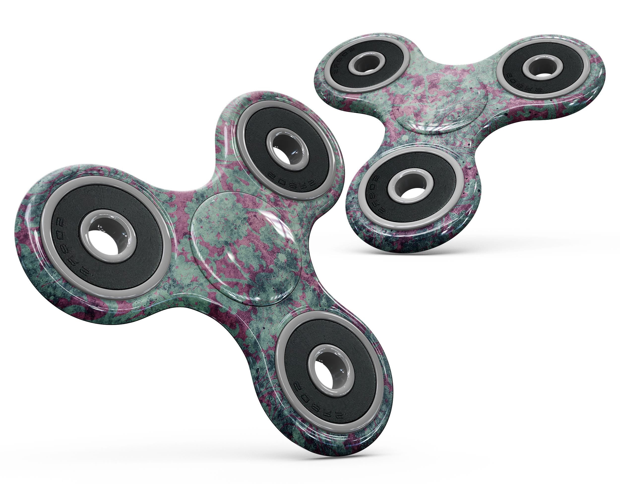 Grungy teal and pink damask pattern skin kit for fidget spinner, showcasing vibrant colors and intricate design.