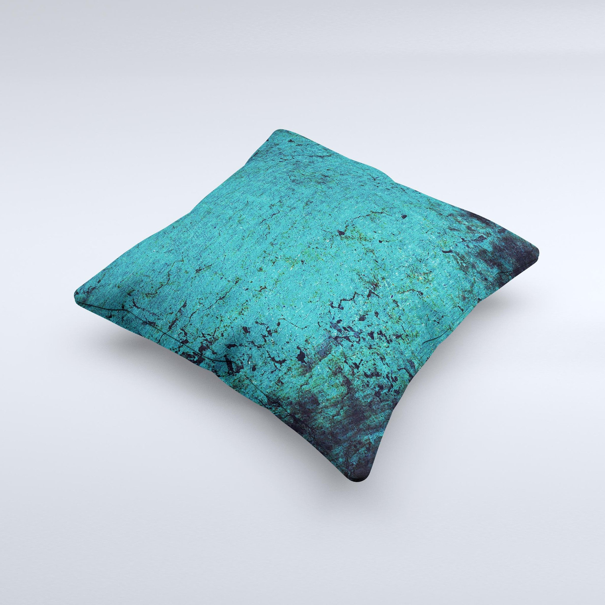 Grungy teal decorative throw pillow with unique ink-fuzed design, handcrafted in Virginia, showcasing high-quality fabric and filling.