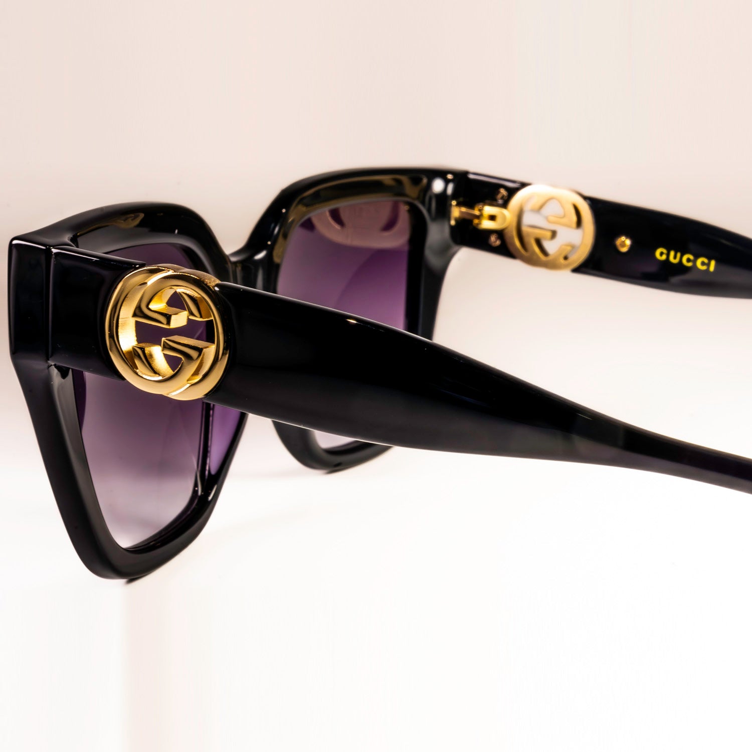 Gucci GG1023S Sunglasses featuring a full rim square frame made of acetate, showcasing a stylish and modern design.