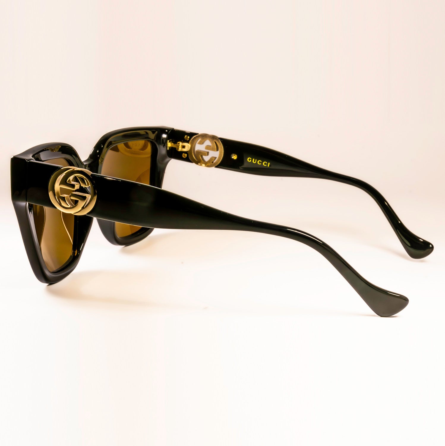 Gucci GG1023S Sunglasses featuring a full rim square frame made of acetate, showcasing a stylish and modern design.