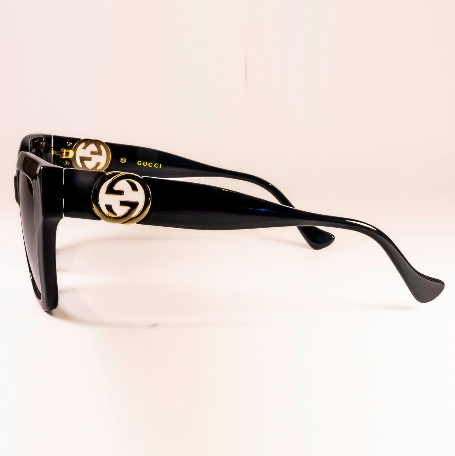 Gucci GG1023S Sunglasses featuring a full rim square frame made of acetate, showcasing a stylish and modern design.